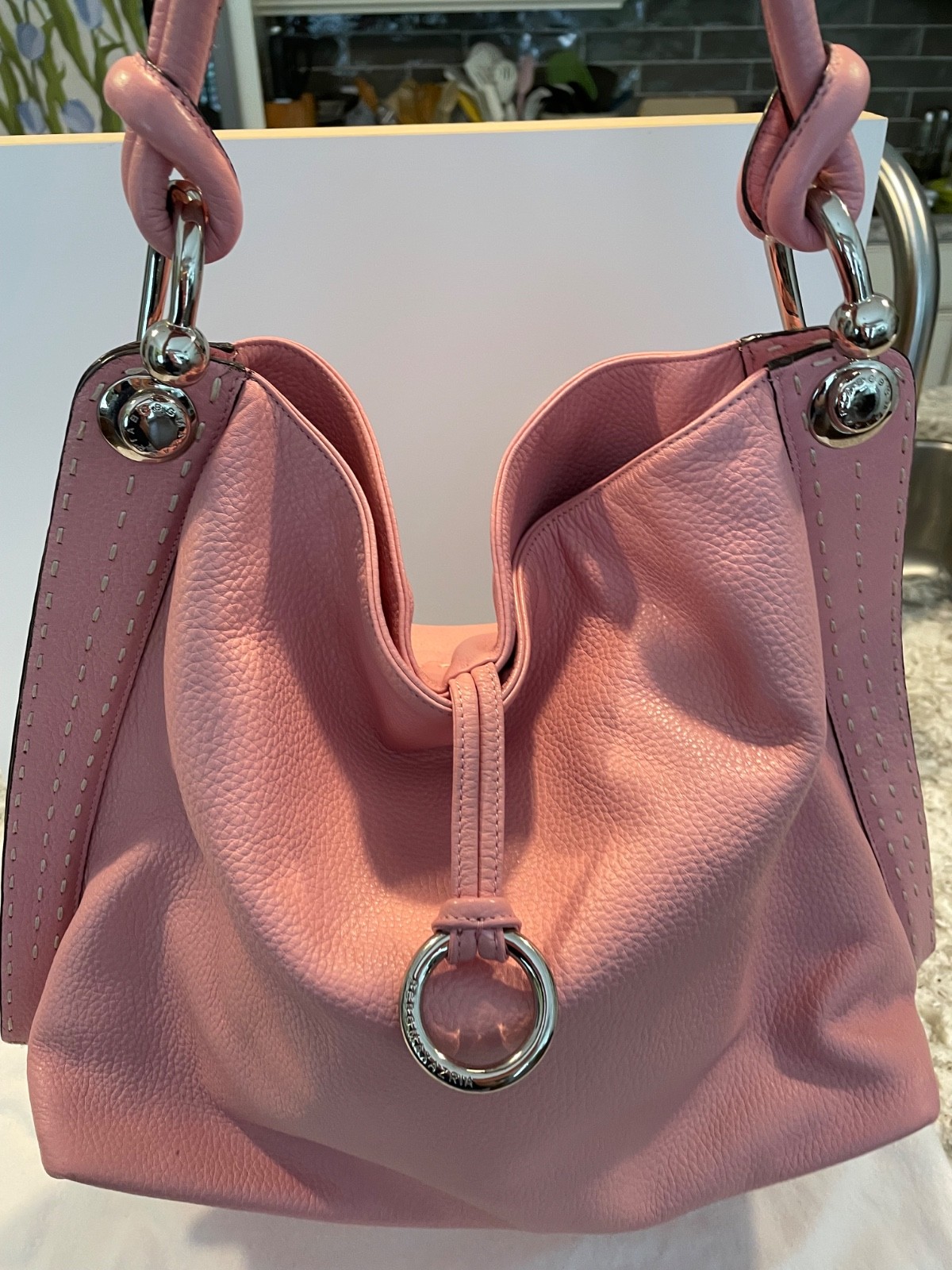 Vintage BCBG pink pebbled leather handbag with silver hardware includes dust bag Vintage BCBG pink pebbled leather handbag with silver hardware includes dust bag