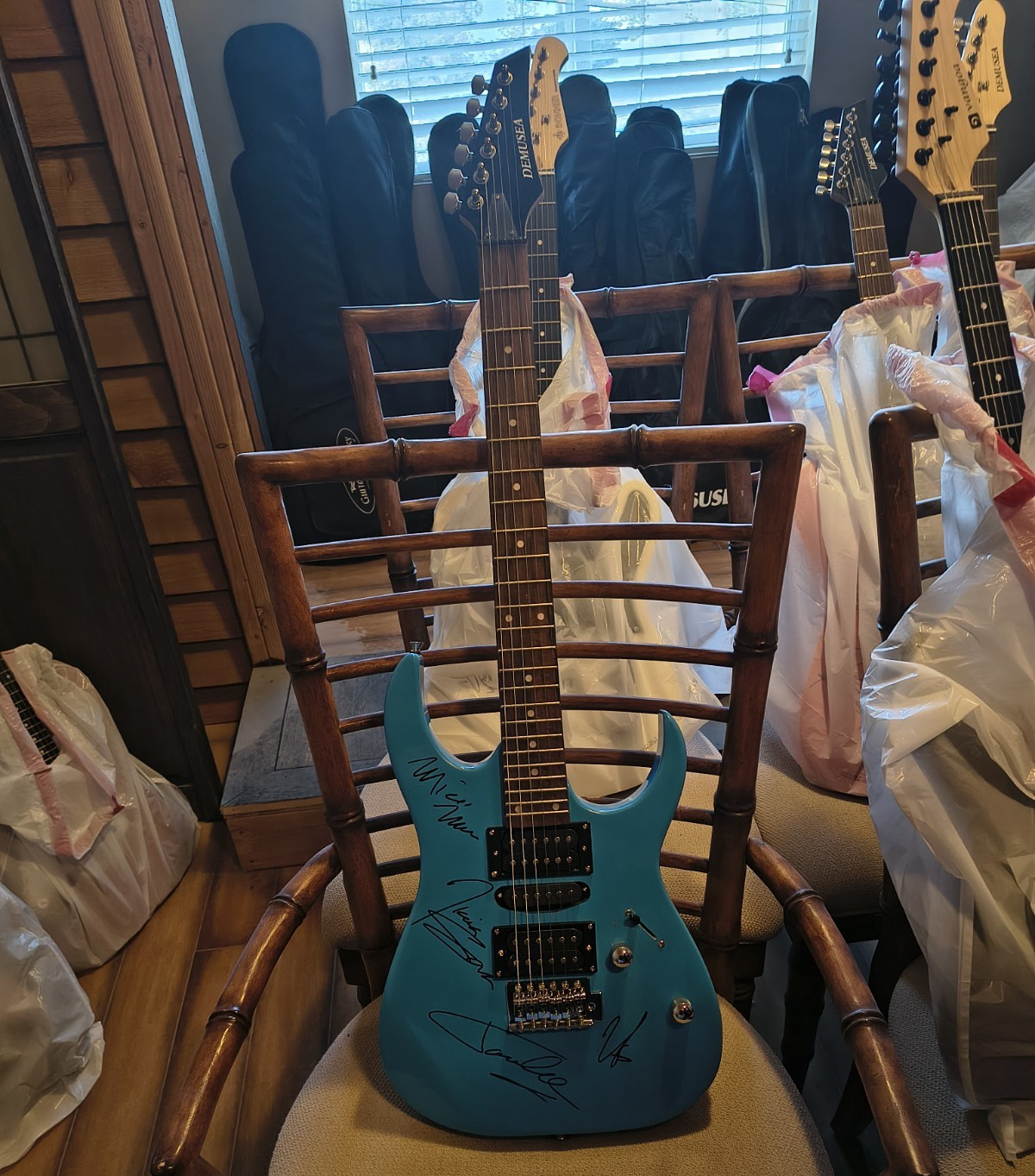 Motley Crue Signed Blue Guitar w/ Inscription “Motley Crue Stadium Tour” Motley Crue Signed Blue Guitar w/ Inscription “Motley Crue Stadium Tour”