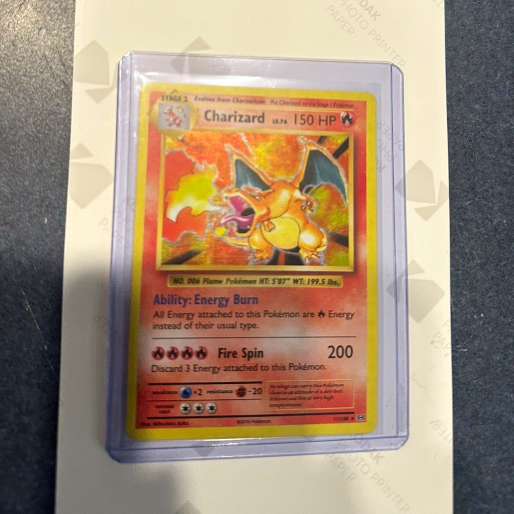 Pokemon Company Evolutions Charizard NM condition With slight white in photos Pokemon Company Evolutions Charizard NM condition With slight white in photos