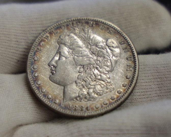 1884 S US Morgan Silver Dollar $ 1XF (Cleaned, Retoned) 1884 S US Morgan Silver Dollar $ 1XF (Cleaned, Retoned)