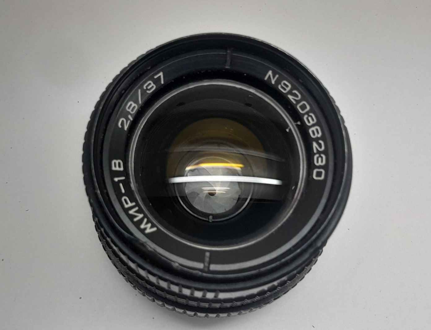 Mir-1B M42 mount 2/37 wide angle functional lens. Has a dent on the filter rim Mir-1B M42 mount 2/37 wide angle functional lens. Has a dent on the filter rim