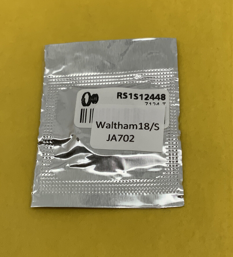 Waltham 18/S Mainspring W/ T End. Part JA702. NOS. Some oxidation has occurred Waltham 18/S Mainspring W/ T End. Part JA702. NOS. Some oxidation has occurred