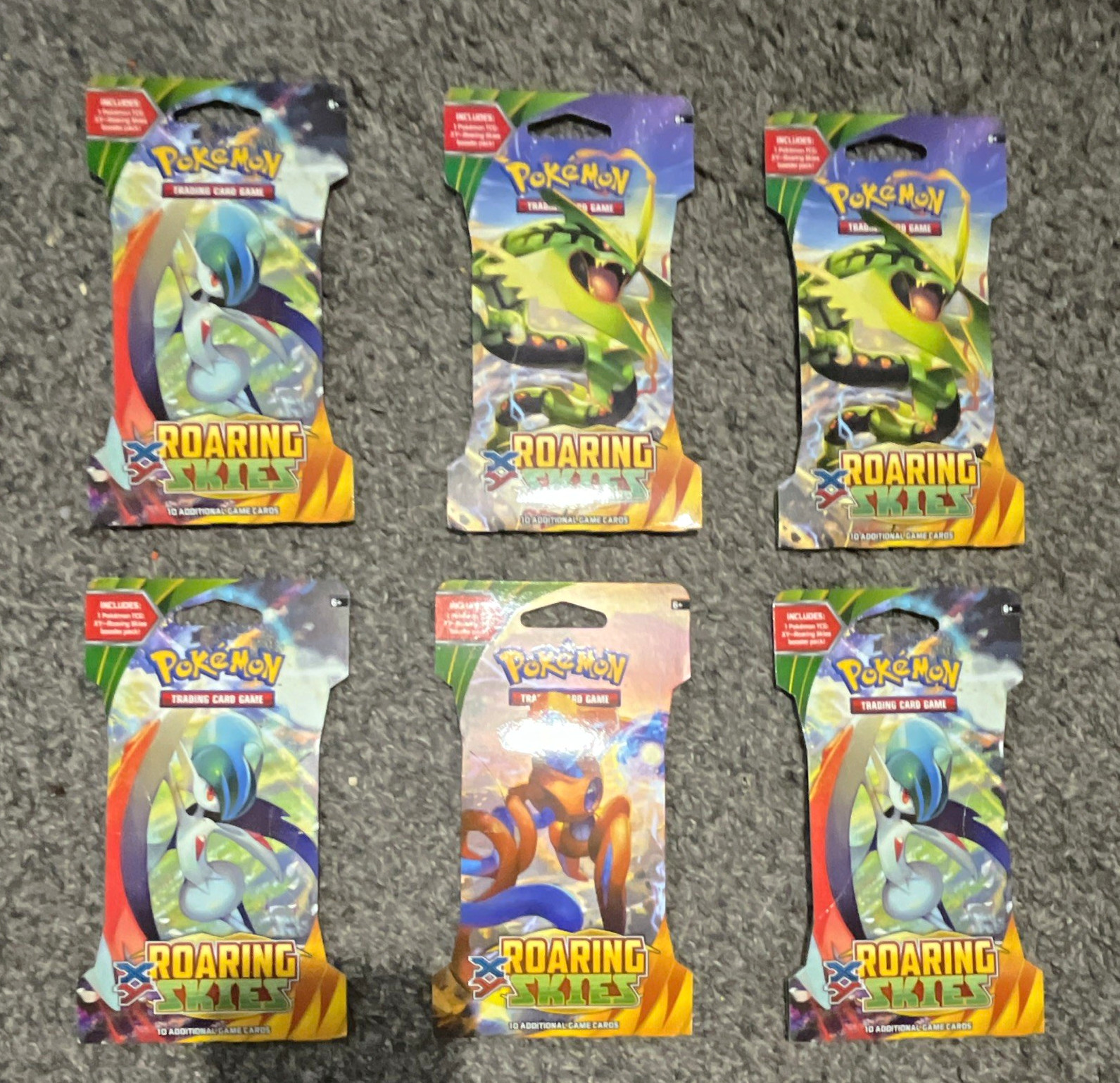 Pokémon TCG Roaring Skies Sleeved Booster Pack Lot 6 Packs (10 Cards Each) 2015 Pokémon TCG Roaring Skies Sleeved Booster Pack Lot 6 Packs (10 Cards Each) 2015