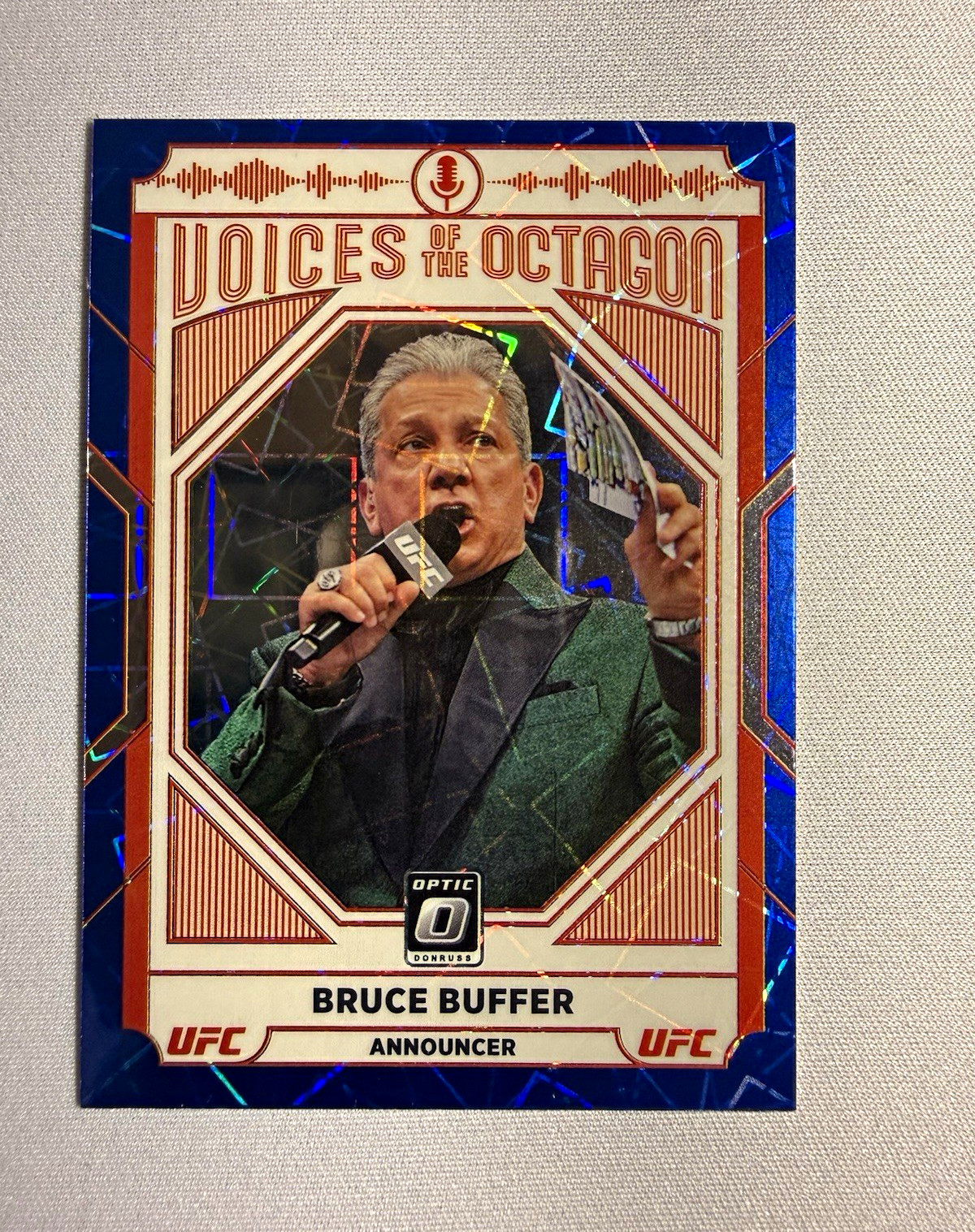 Panini 2022 Donruss Optic UFC Voices of the Octagon Bruce Buffer #121 Blue Panini 2022 Donruss Optic UFC Voices of the Octagon Bruce Buffer #121 Blue