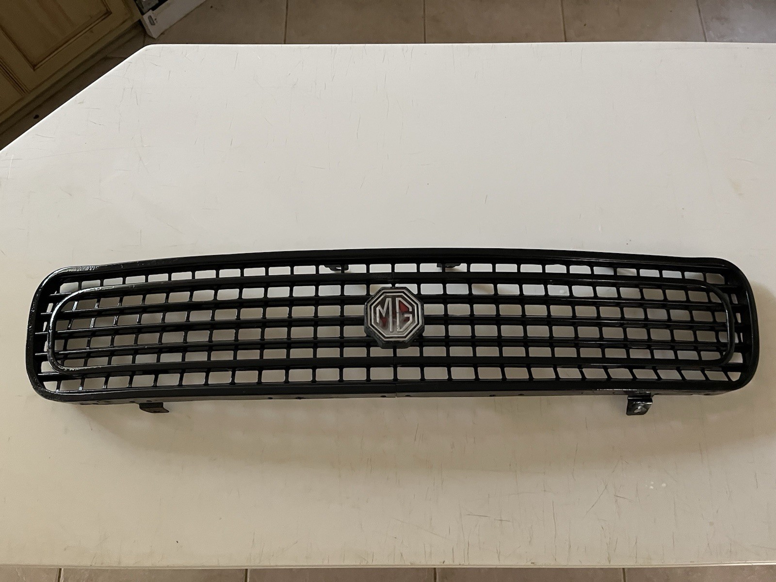 MG MIDGET ORIGINAL FRONT GTILLE 1970-1974 MG MIDGET ORIGINAL FRONT GTILLE 1970-1974