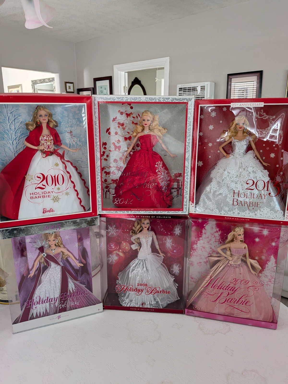 Bundle of 6 Holiday Barbies 2005,2008,2009,2010,2012,2013. Mint Condition. Bundle of 6 Holiday Barbies 2005,2008,2009,2010,2012,2013. Mint Condition.