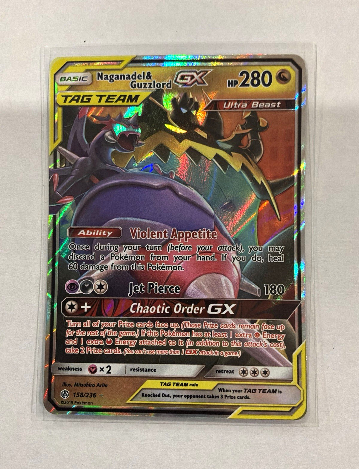 The Pokémon Naganadel & Guzzlord GX 158/236 Cosmic Eclipse Holo UR 280 HP EN The Pokémon Naganadel & Guzzlord GX 158/236 Cosmic Eclipse Holo UR 280 HP EN