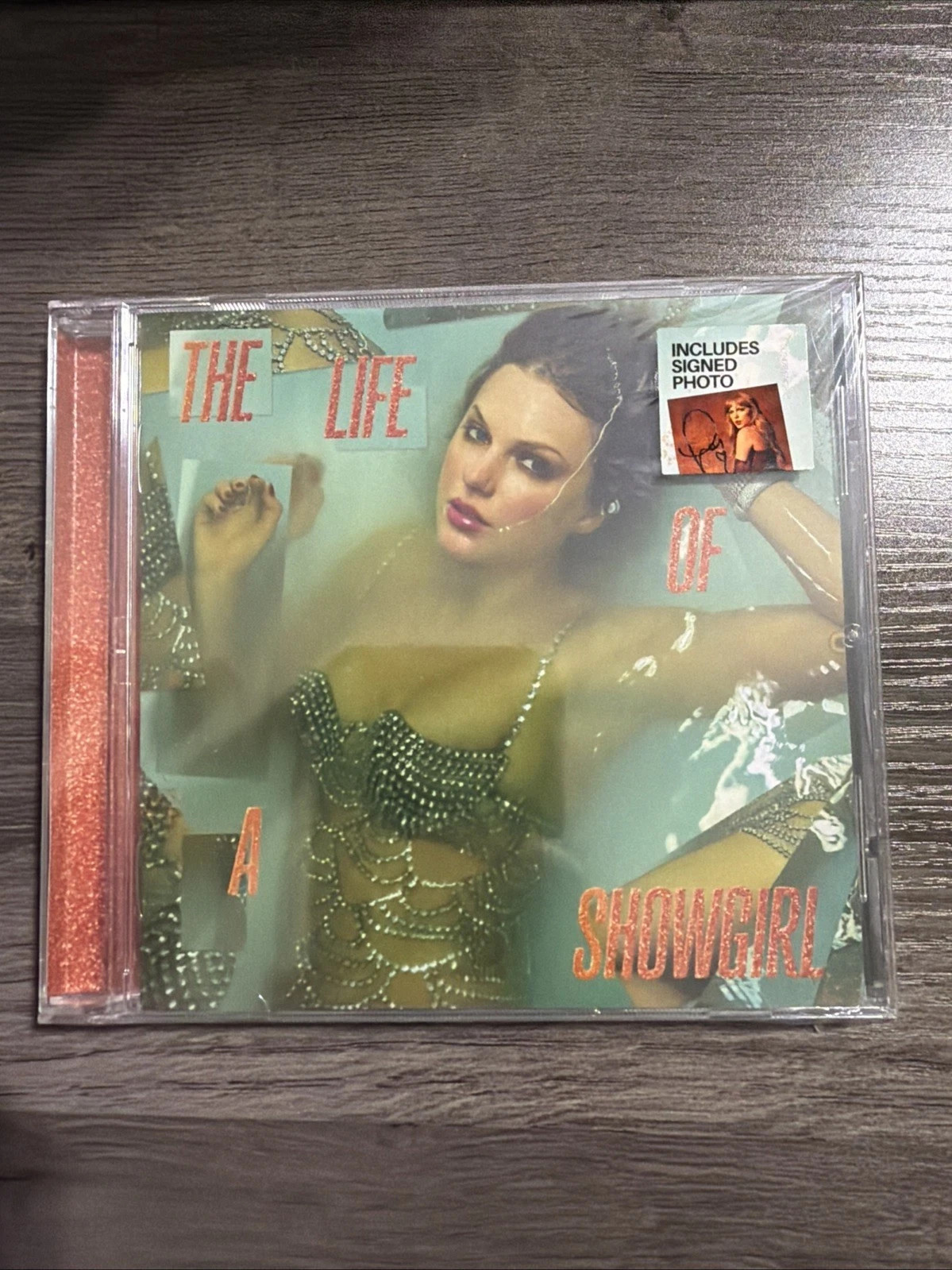 Taylor Swift The Life of a Showgirl CD + Hand Signed Photo 3 Sealed In Hand Taylor Swift The Life of a Showgirl CD + Hand Signed Photo 3 Sealed In Hand