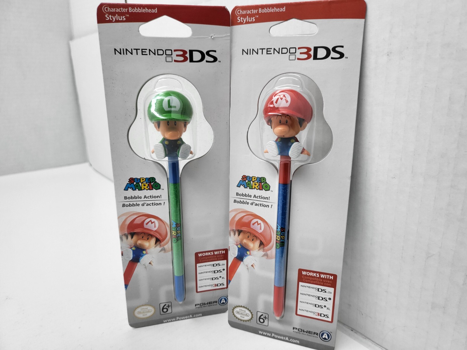 2 NEW LARGE BOBBLE HEAD STYLUS 1 SUPER MARIO BROS. & 1 LUIGI BOBBLEHEAD
