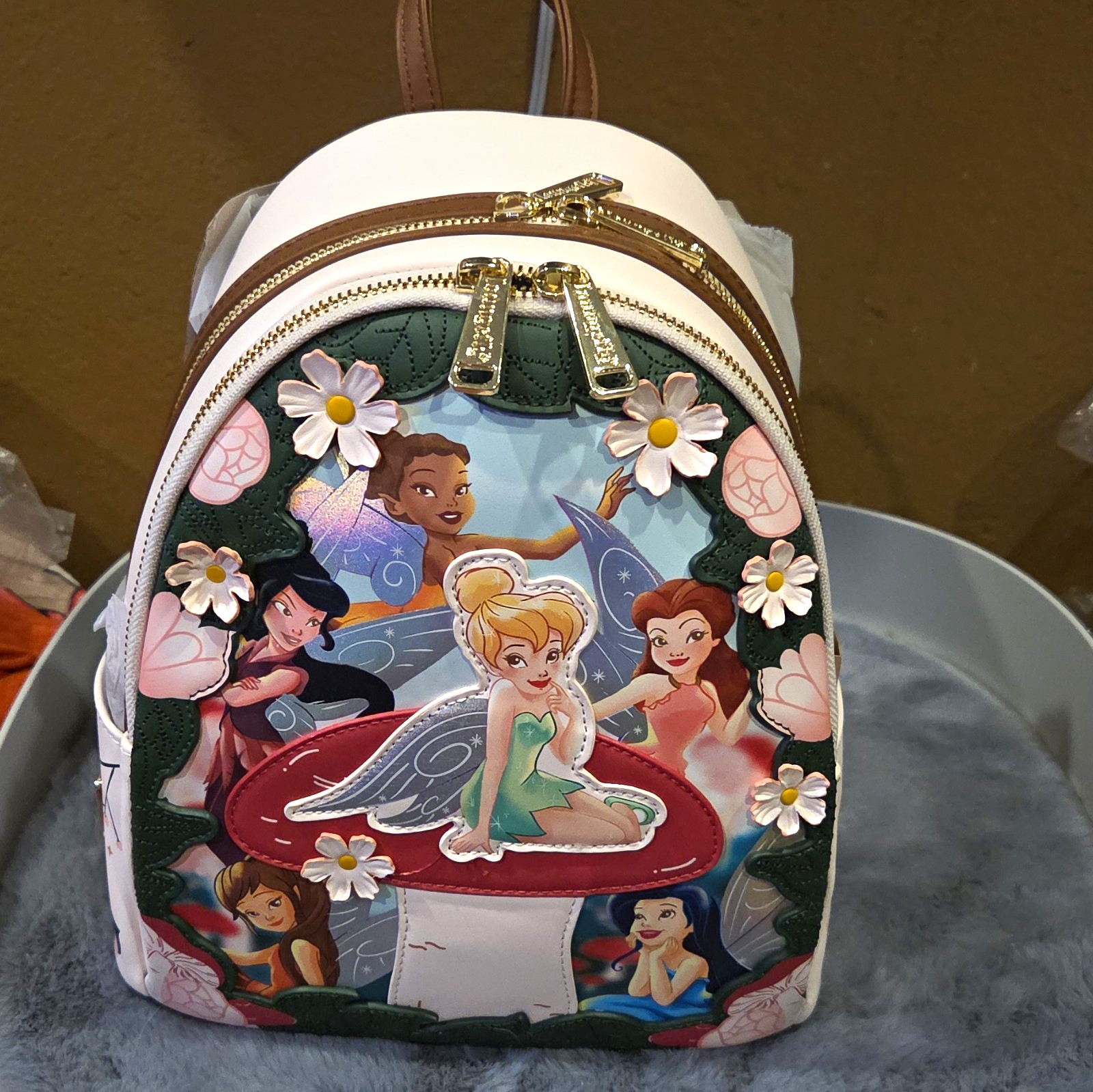 Loungefly Disney Tinker Bell Mini Backpack White/Brown Multicolor Floral Loungefly Disney Tinker Bell Mini Backpack White/Brown Multicolor Floral