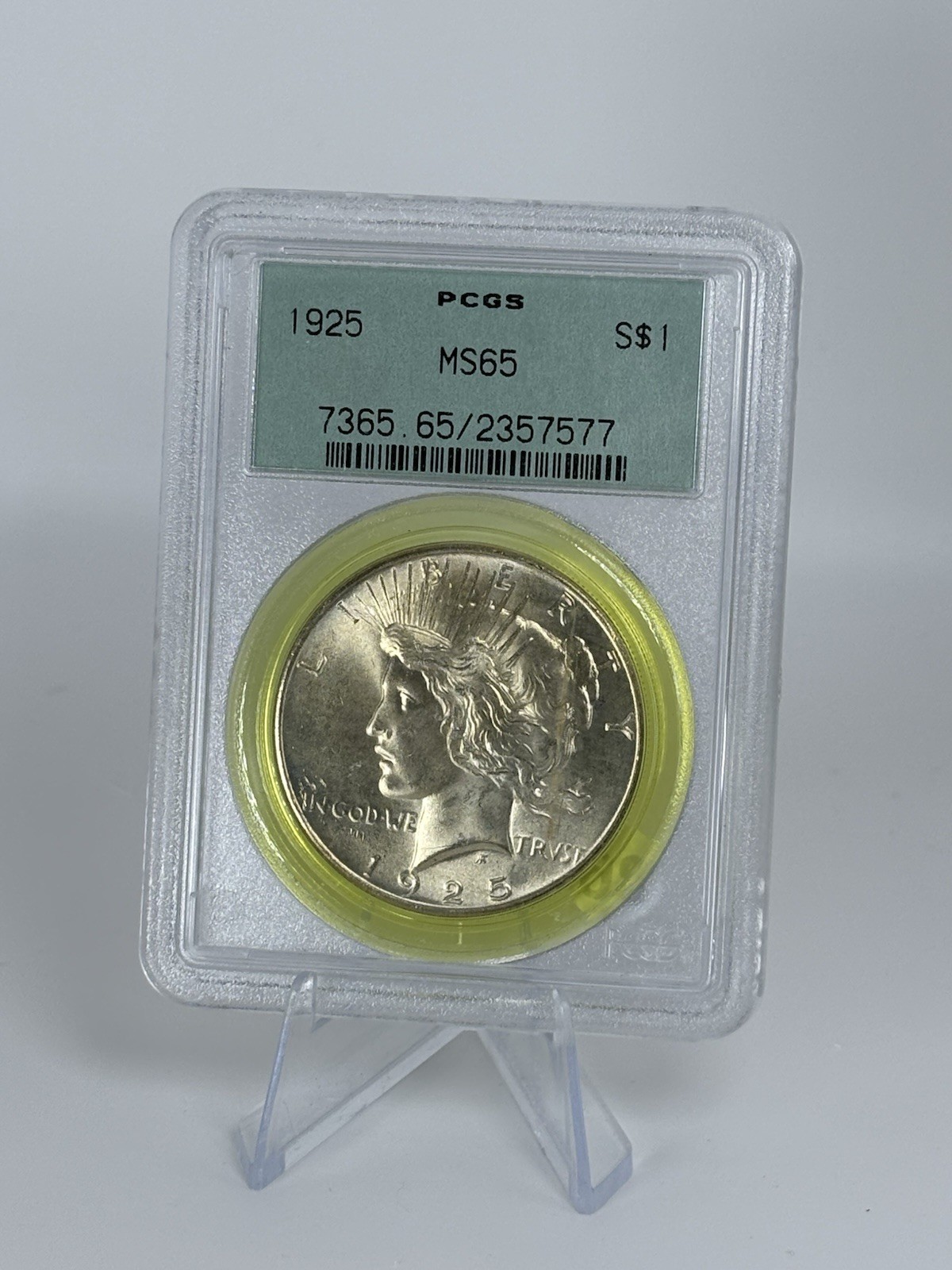 Peace Silver Dollar 1925 Philadelphia Mint PCGS MS65 Green Label Gold Toner #98 Peace Silver Dollar 1925 Philadelphia Mint PCGS MS65 Green Label Gold Toner #98
