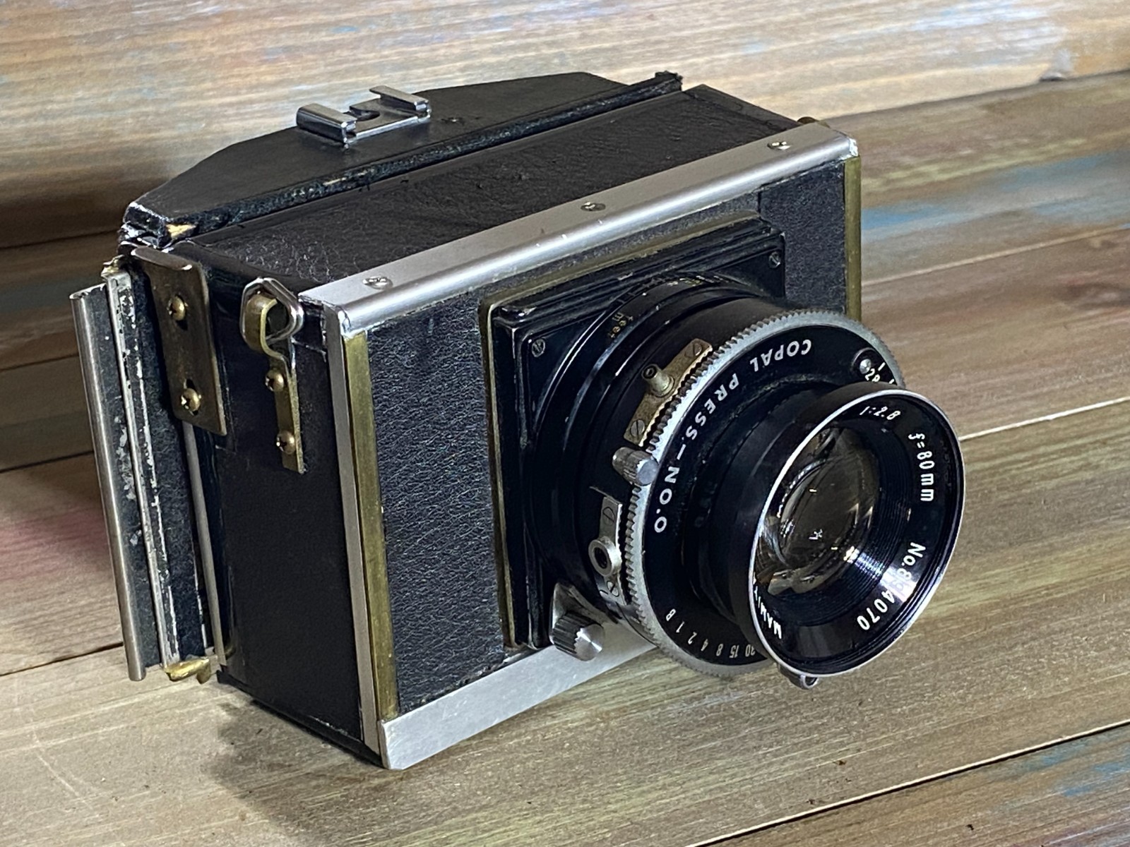 Vintage camera Has Mamiya-Sekor 80mm, f/2.8 lens & Copal Press No. 0 shutter