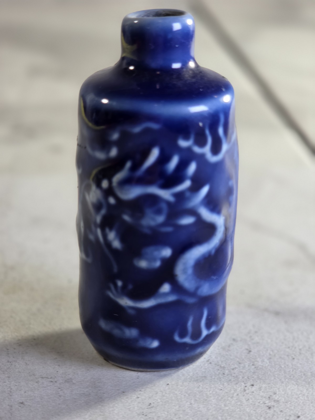 Vintage Chinese Cobalt Blue Glaze Molded Relief Dragon Porcelain Snuff Bottle Vintage Chinese Cobalt Blue Glaze Molded Relief Dragon Porcelain Snuff Bottle