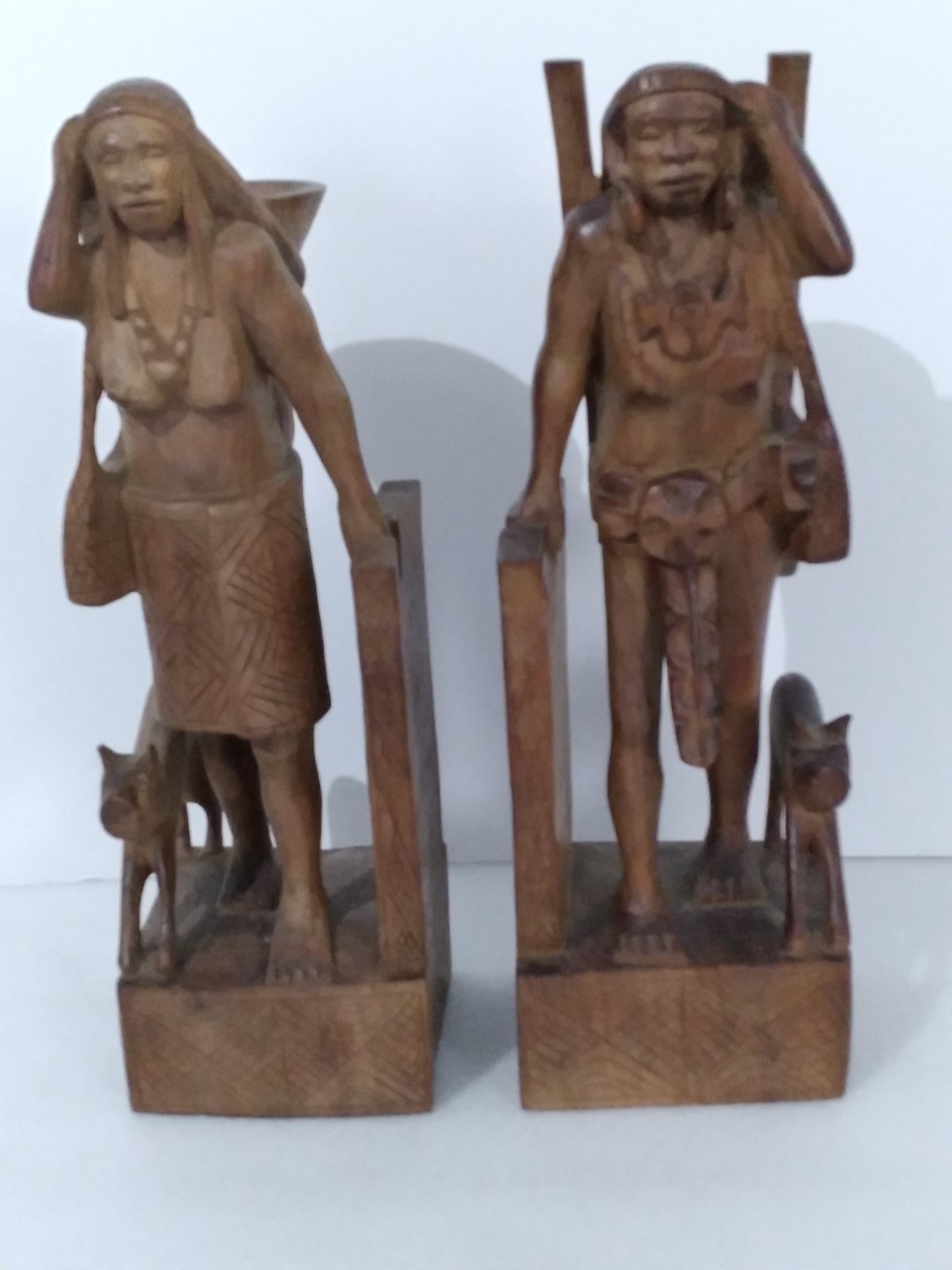 Antique Hand Carved Wood Igorot Tribal Sculptures of Hunter and Female Bookends Antique Hand Carved Wood Igorot Tribal Sculptures of Hunter and Female Bookends
