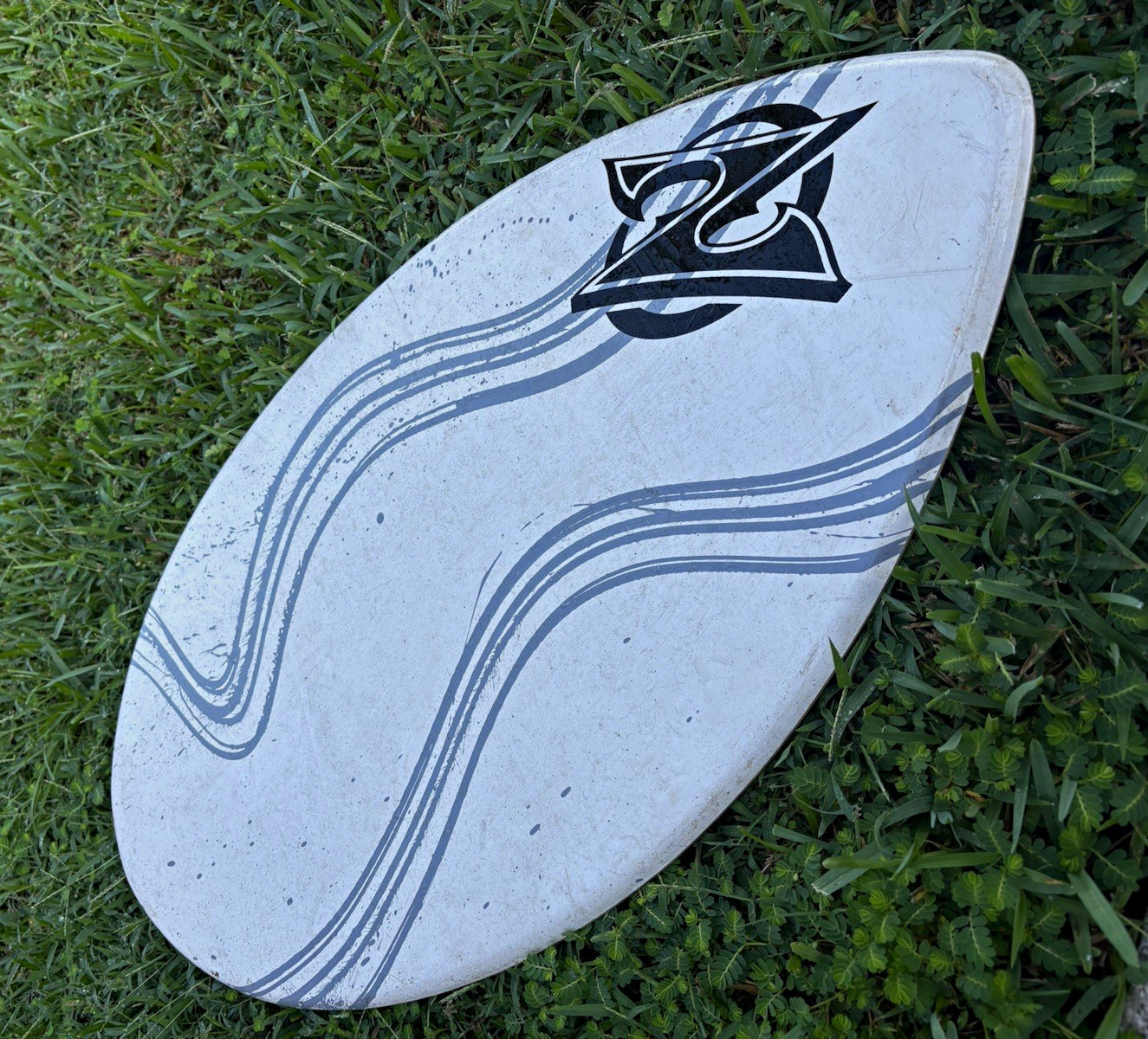 Vintage ZAP White Teardrop Skimboard w/ Gray Wave Stripes, Logo Graphic Design Vintage ZAP White Teardrop Skimboard w/ Gray Wave Stripes, Logo Graphic Design