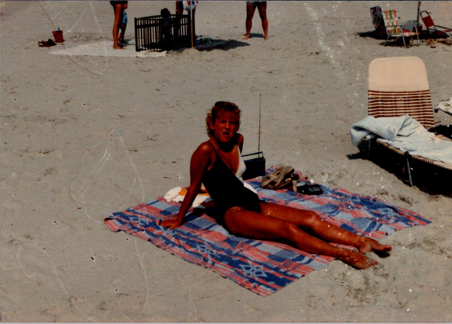 1970s Beach Photograph of Young Woman in Swimsuit Joyful Summer Leisure Scene