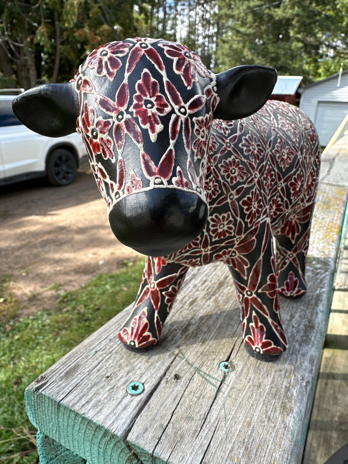 Home decor hand painted cow, cream burnt orange black ceramic 6.5” tall, 10.5” L Home decor hand painted cow, cream burnt orange black ceramic 6.5” tall, 10.5” L