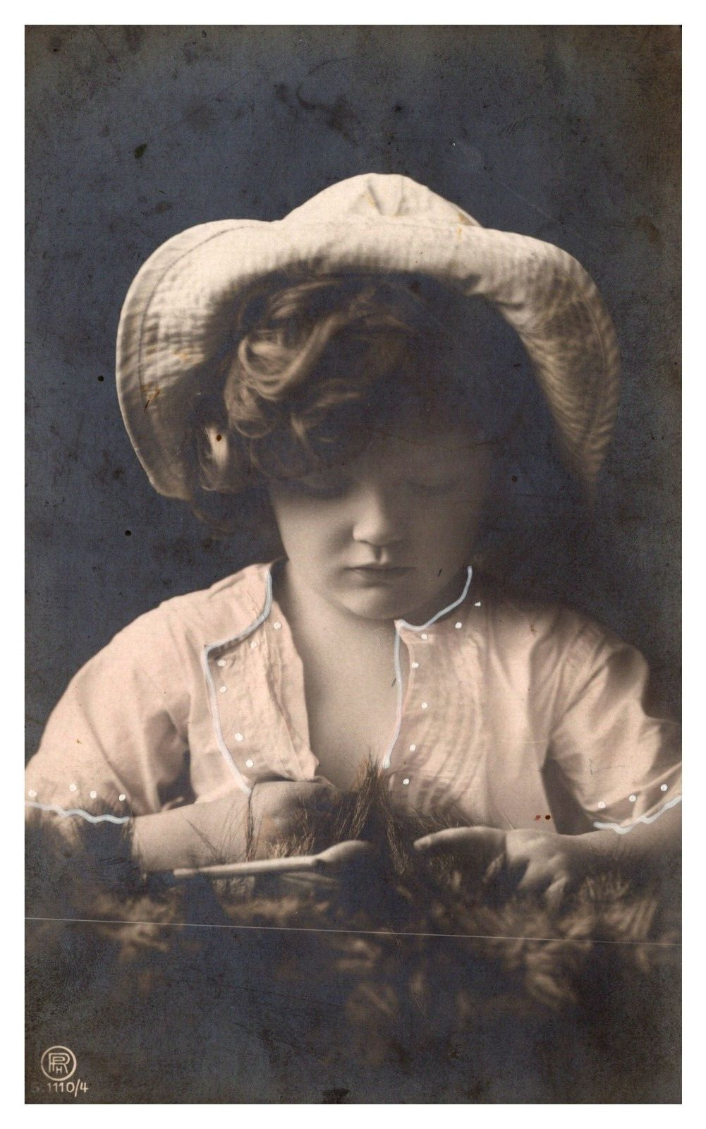 postcard Real Photo of young girl with fury object A0001 postcard Real Photo of young girl with fury object A0001