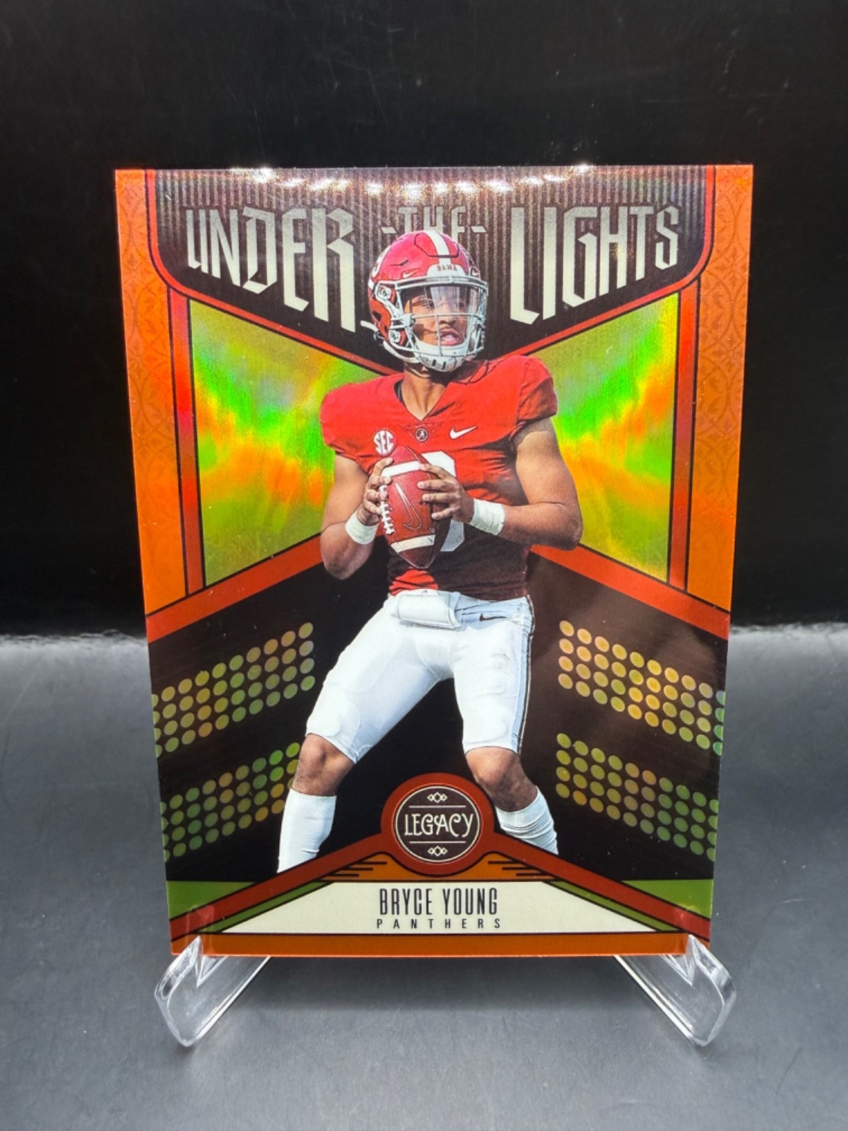 2023 Panini Legacy Bryce Young Under The Lights Orange Rookie /149 (RC) #UL-BYO 2023 Panini Legacy Bryce Young Under The Lights Orange Rookie /149 (RC) #UL-BYO