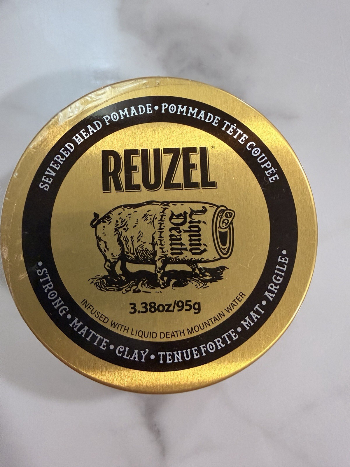 Reuzel Liquid Death Severed Head Strong Matte Pomade 3.38oz New Product Reuzel Liquid Death Severed Head Strong Matte Pomade 3.38oz New Product