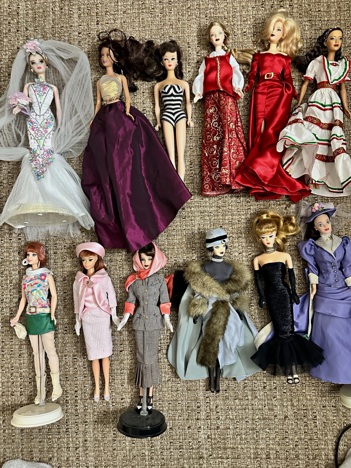 12 rare opened BARBIES. Some collectibles. Treated carefully. No boxes. 12 rare opened BARBIES. Some collectibles. Treated carefully. No boxes.