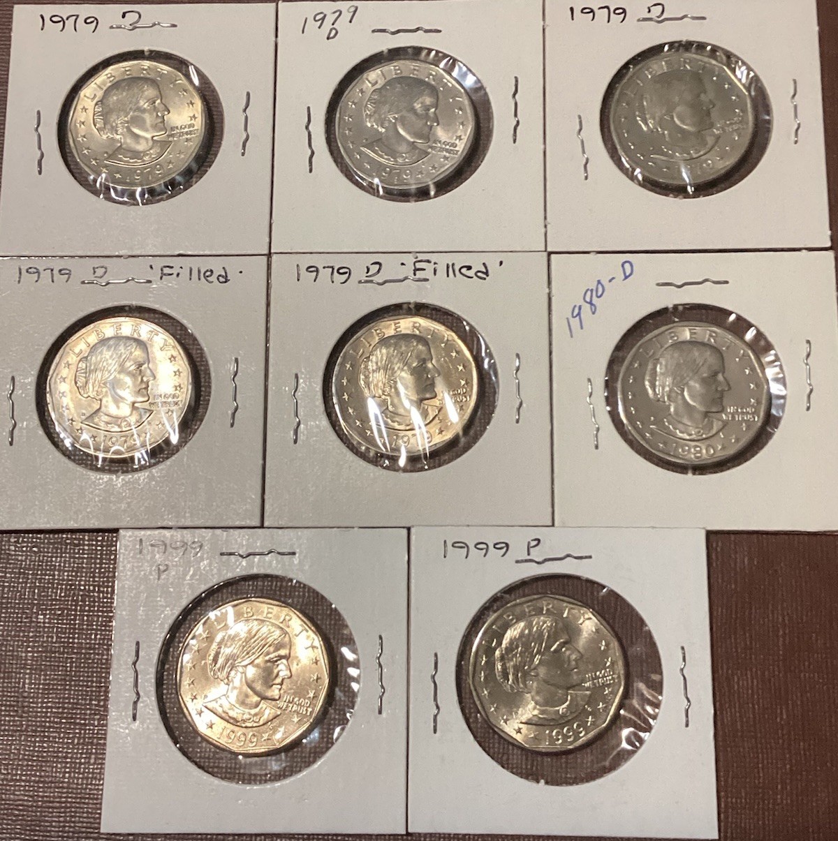Lot of 8 - High Grade Susan B. Anthony Dollar Coins, 1979 (1st Year), 1980, 1999