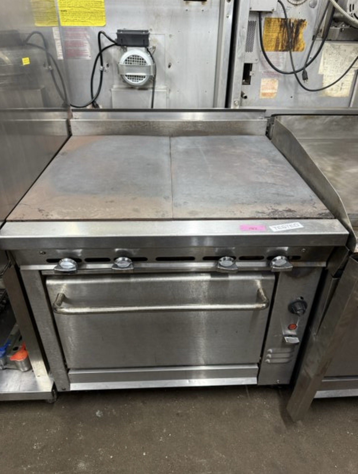 MONTAGUE 36-9ASE 36” COMMERCIAL OVEN AND 2 EVEN HEAT HOT TOPS USED NAT GAS