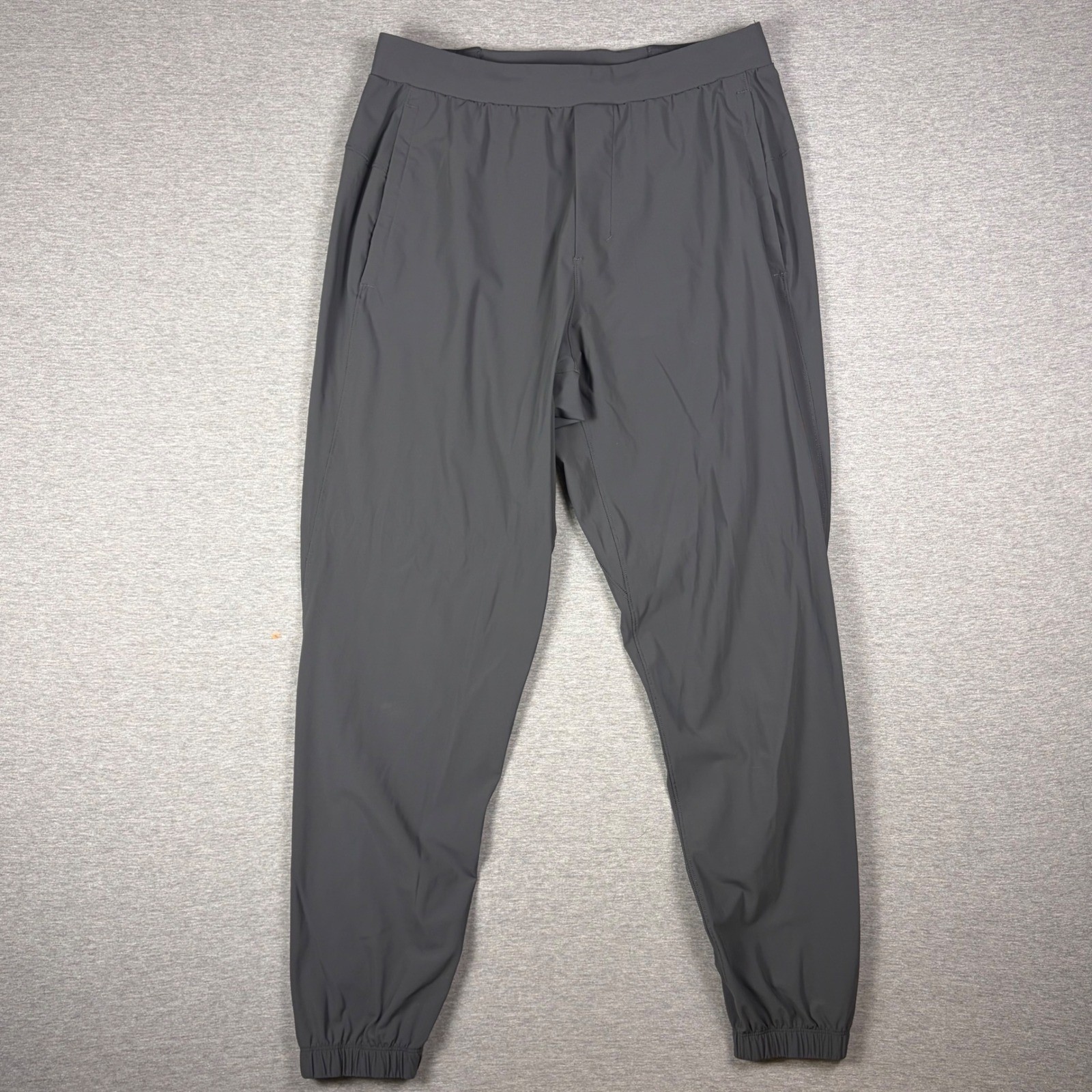 Lululemon Surge Joggers Mens M Graphite Gray Hybrid Pant Ankle Zip
