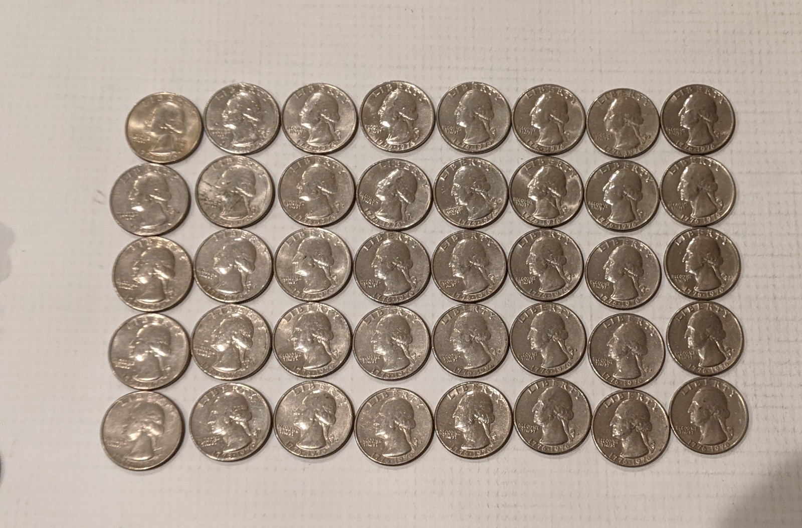 Roll of 1776-1976 P and D bicentenial quater roll AU-Bu quality Roll of 1776-1976 P and D bicentenial quater roll AU-Bu quality