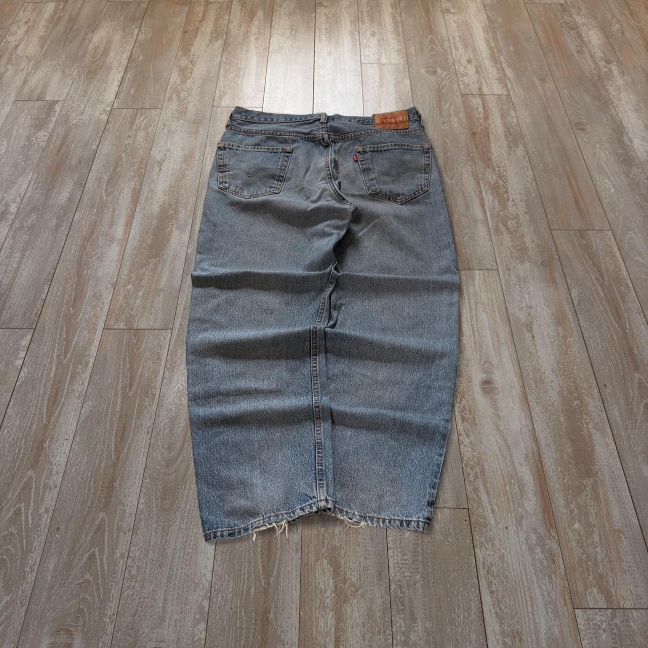 Vintage Levi\'s 550 light washed faded distressed jeans blue essential Vintage Levi\'s 550 light washed faded distressed jeans blue essential