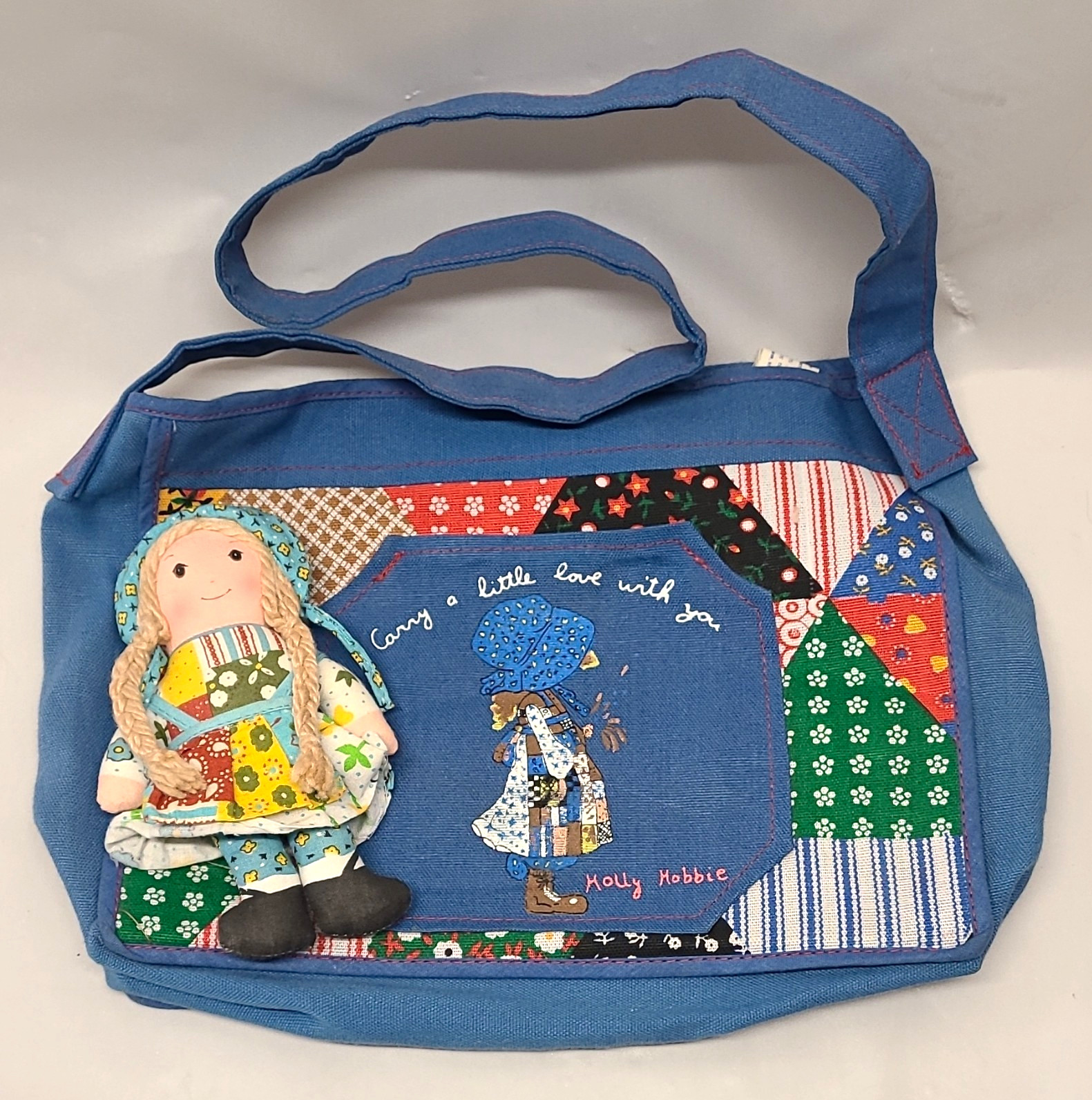 American Greetings Holly Hobbie Patchwork Blue Zip Shoulder Bag w/ Charm Pockets American Greetings Holly Hobbie Patchwork Blue Zip Shoulder Bag w/ Charm Pockets