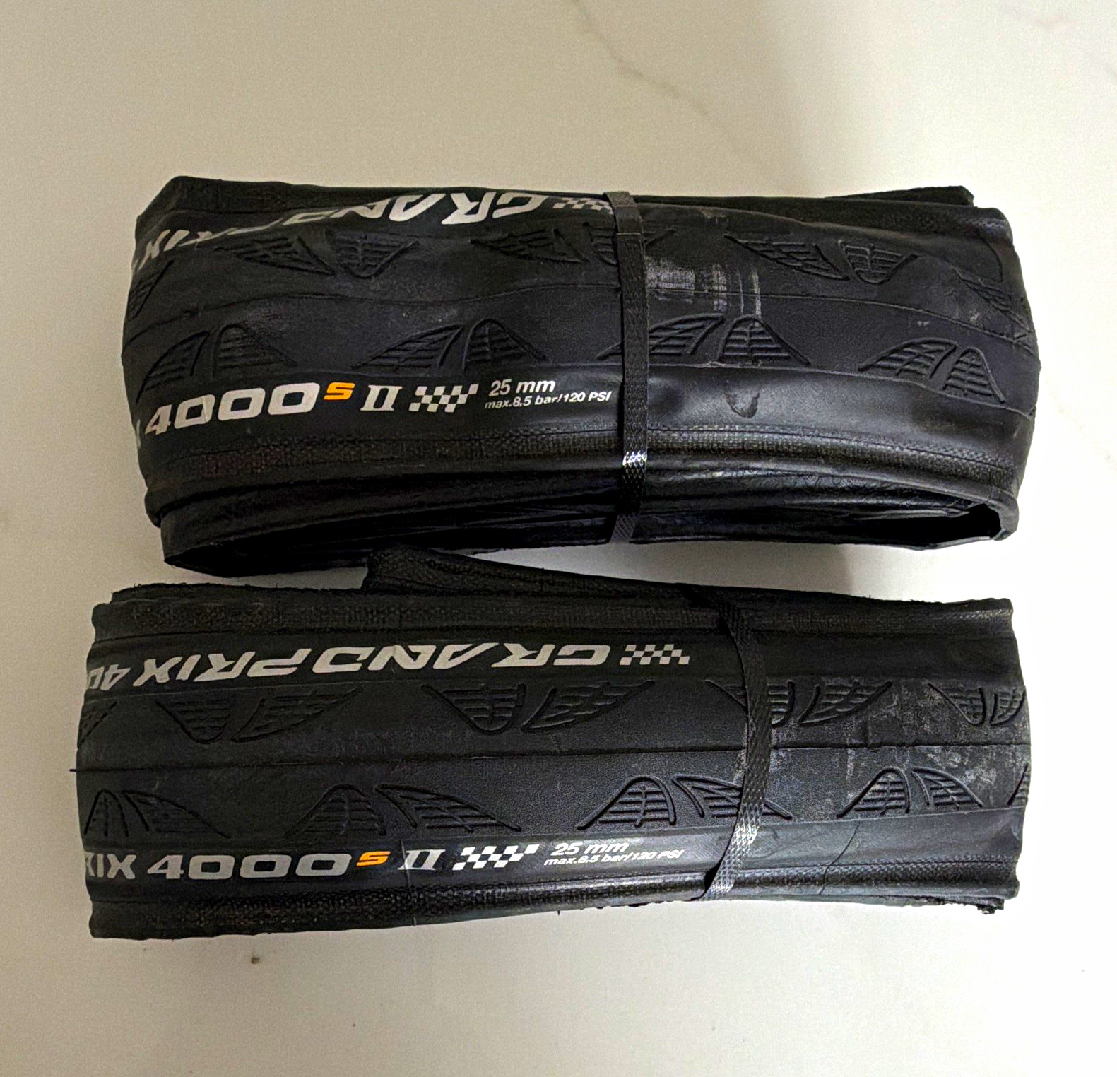 Pair of Continental Grand Prix 4000 S II Folding Road Tires - 700x25c (NOS) Pair of Continental Grand Prix 4000 S II Folding Road Tires - 700x25c (NOS)