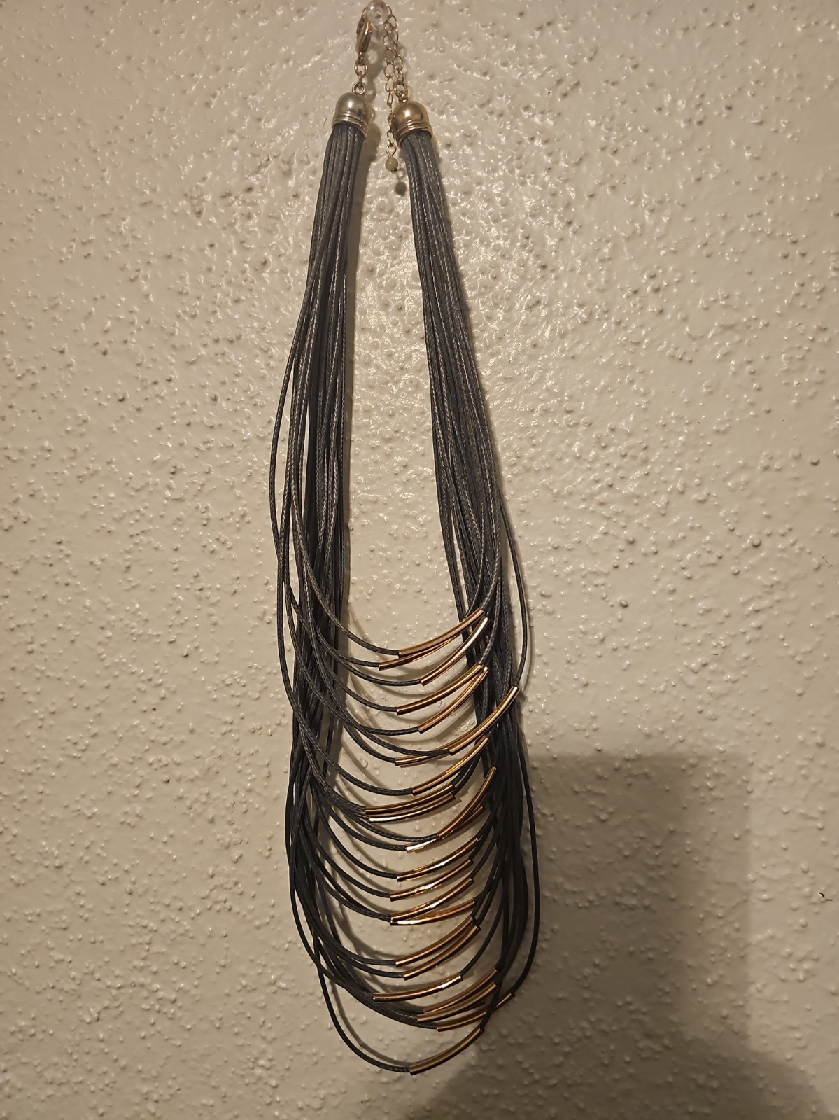 Avon  Gray Suede And Gold Slide Bar Necklace