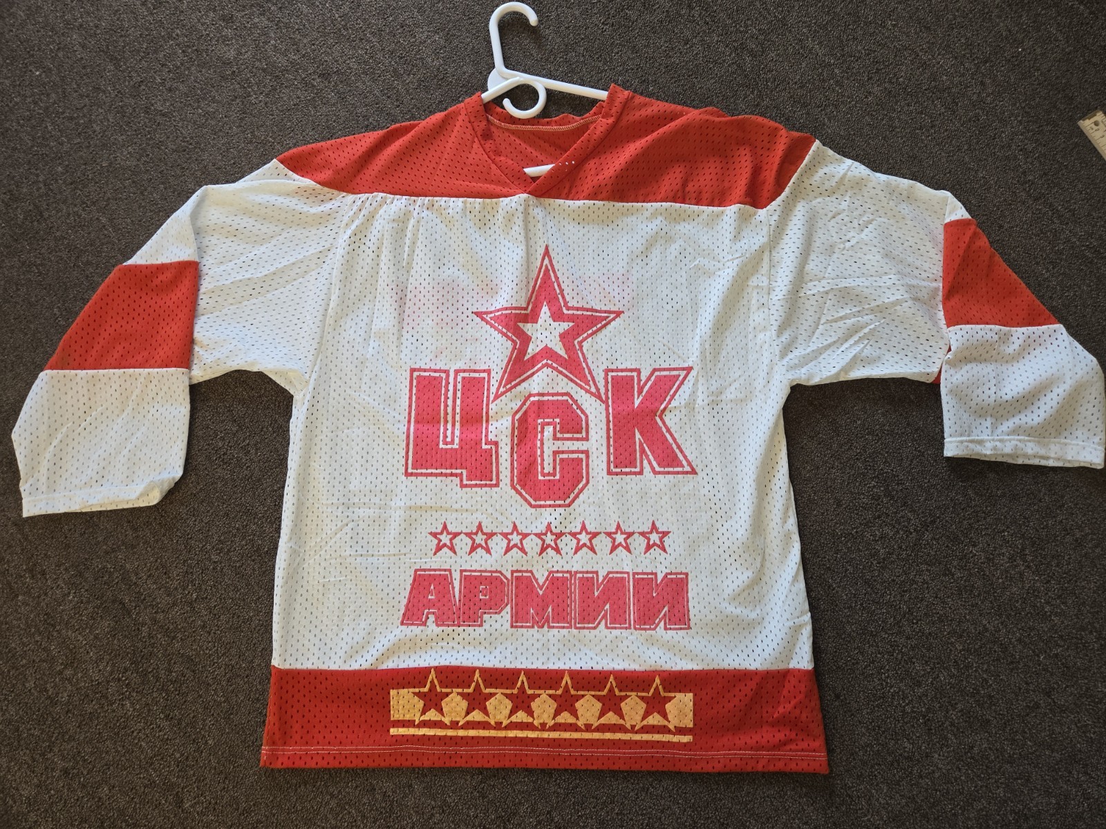 vintage Soviet-era white and red HC CSKA Moscow hockey jersey #16 Petrov
