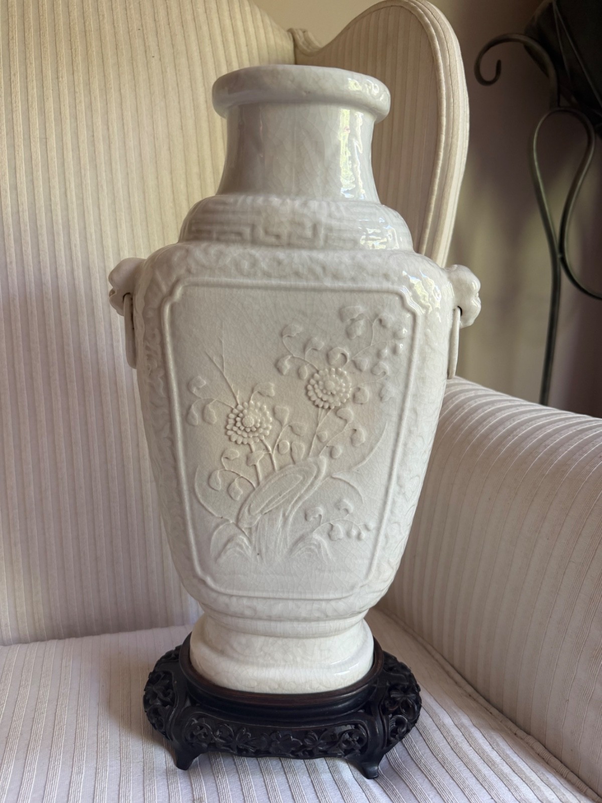 A LARGE ANTIQUE CHINESE MOULDED WHITE-GLAZED SQUARE FLORAL AND DRAGON VASE A LARGE ANTIQUE CHINESE MOULDED WHITE-GLAZED SQUARE FLORAL AND DRAGON VASE