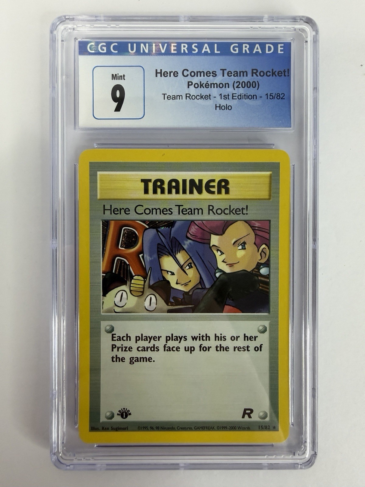 Pokemon Here Comes Team Rocket 15/82 Team Rocket 1st Edition Holo CGC 9 Pokemon Here Comes Team Rocket 15/82 Team Rocket 1st Edition Holo CGC 9