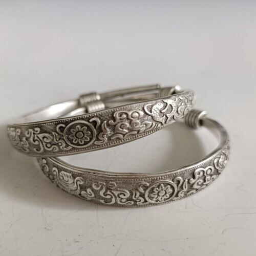 A Pair Old Chinese tibet silver handcarved Auspicious patterns Bracelets A Pair Old Chinese tibet silver handcarved Auspicious patterns Bracelets