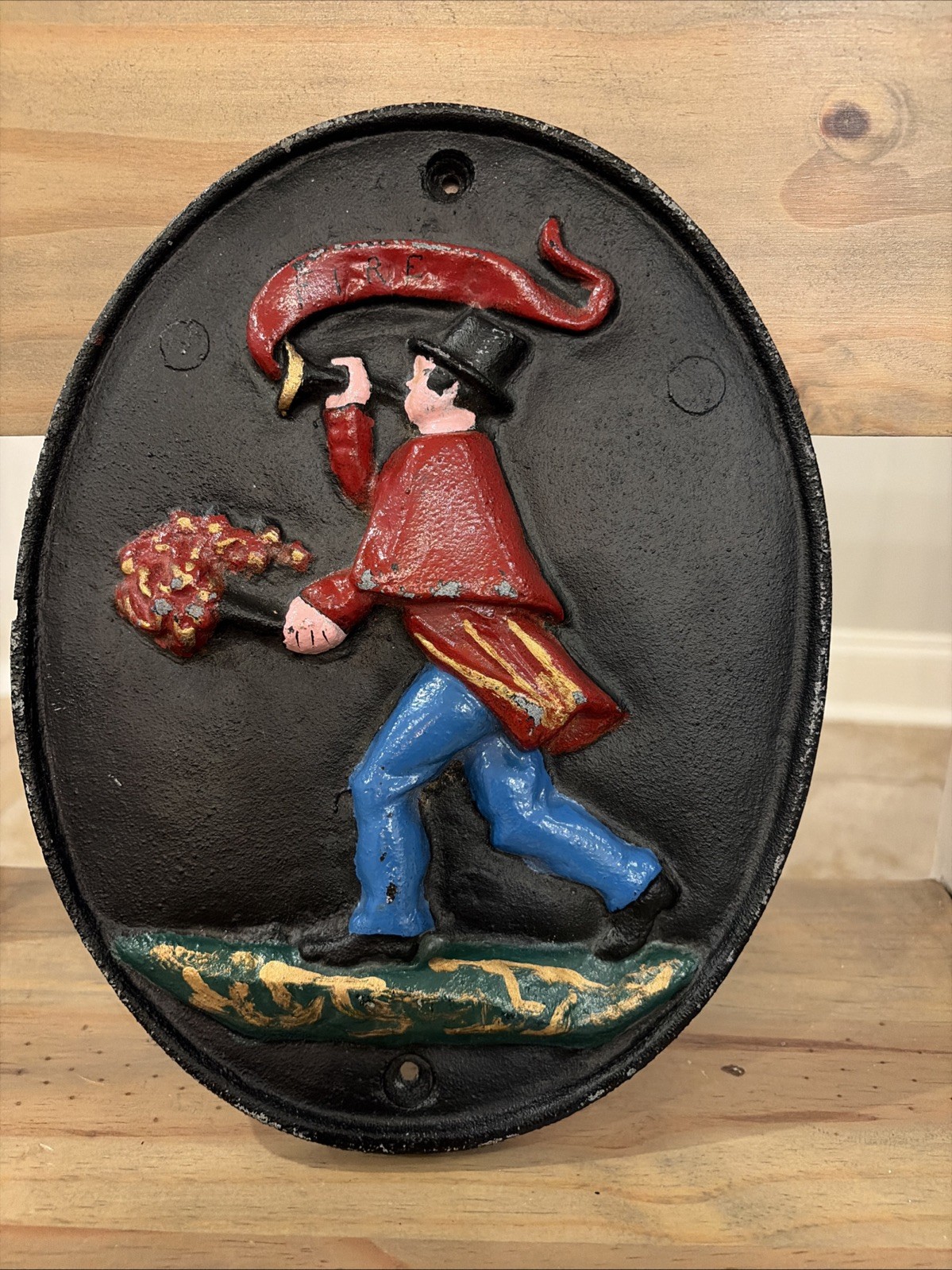 VINTAGE FIREFIGHTER BLOWING HORN CAST IRON FIRE MARK PLAQUE VINTAGE FIREFIGHTER BLOWING HORN CAST IRON FIRE MARK PLAQUE