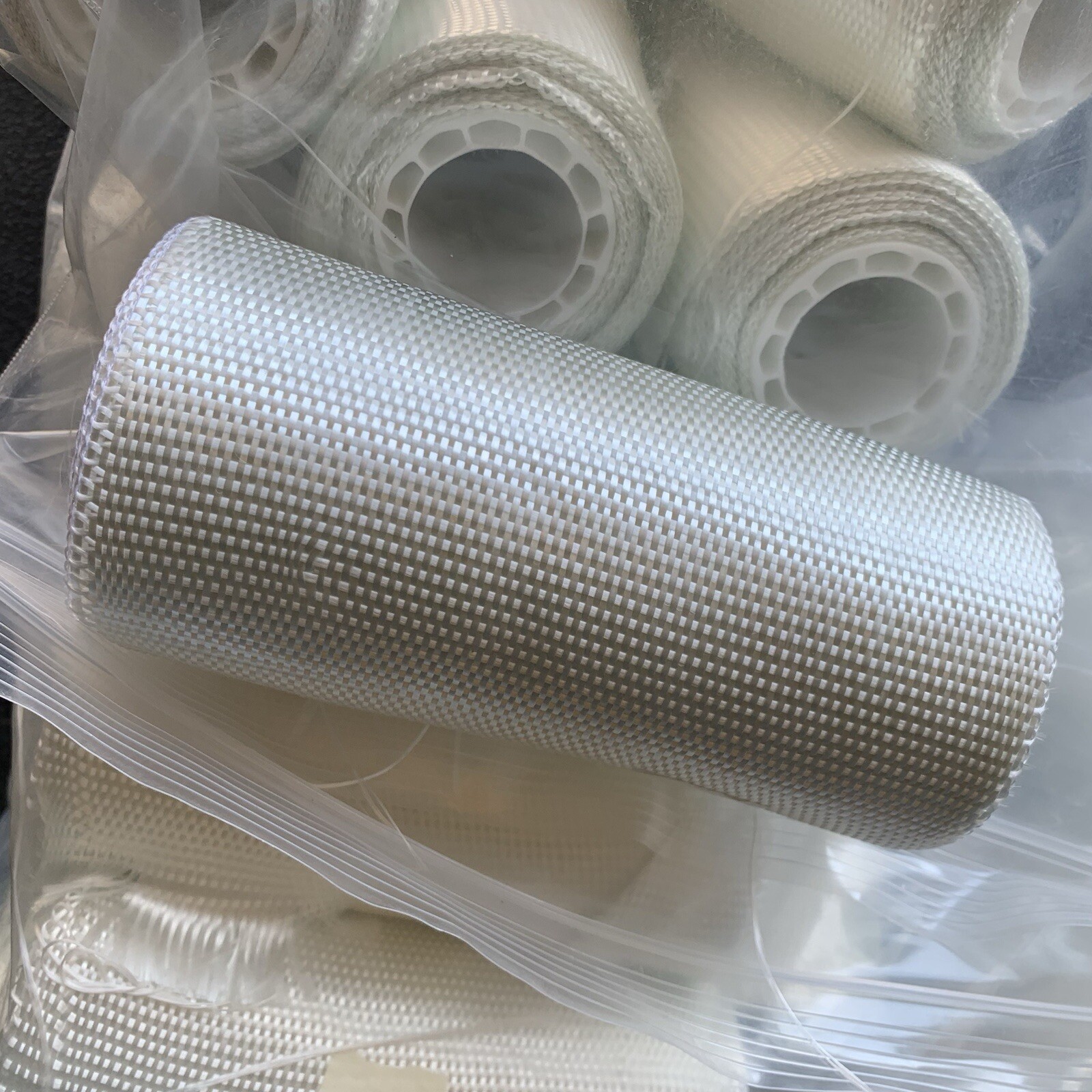 Woven Fiberglass Cloth 6”x 20’ Lot Of 7 Rolls. Woven Fiberglass Cloth 6”x 20’ Lot Of 7 Rolls.