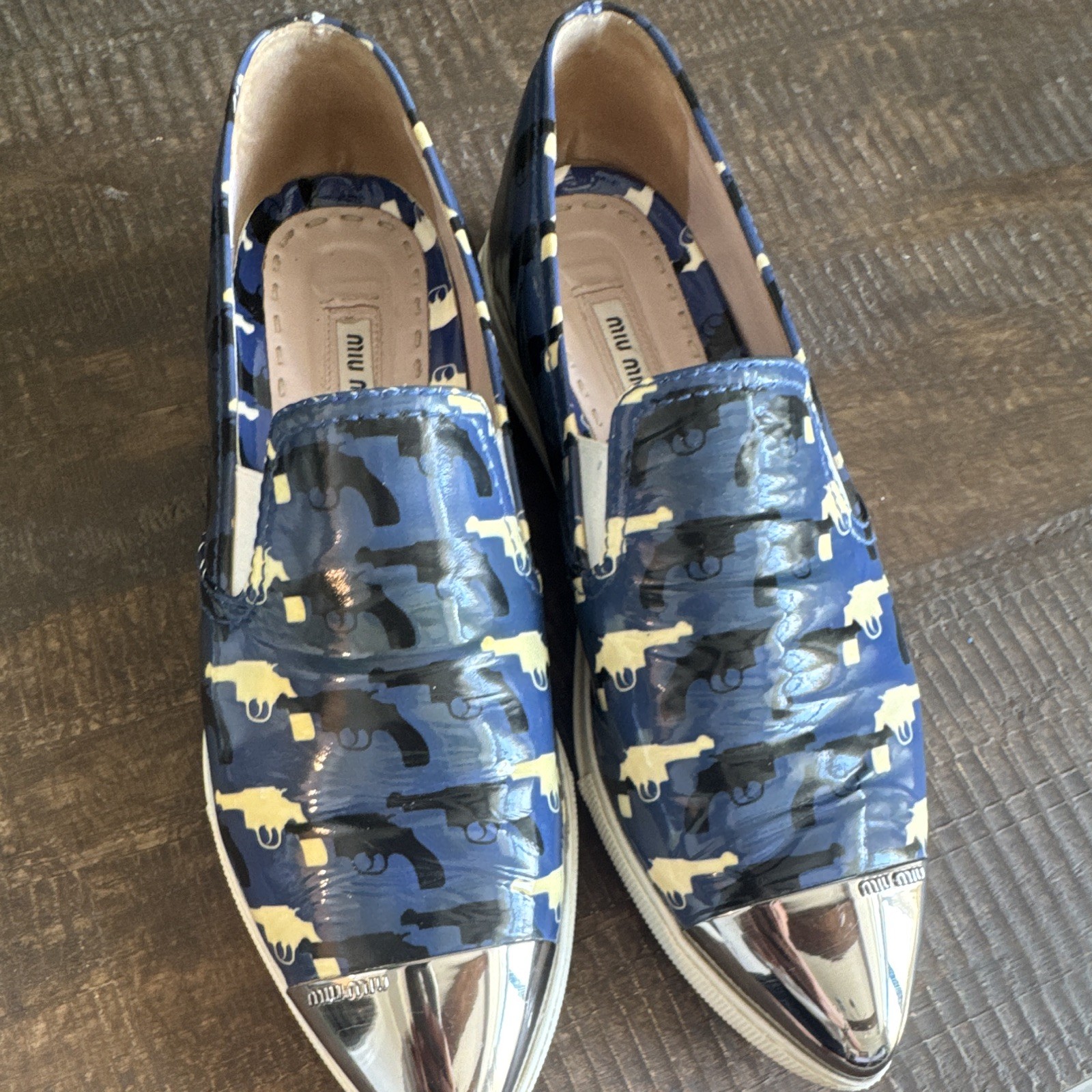 Miu Miu patent leather gun print slip on shoe size 37 rare Miu Miu patent leather gun print slip on shoe size 37 rare