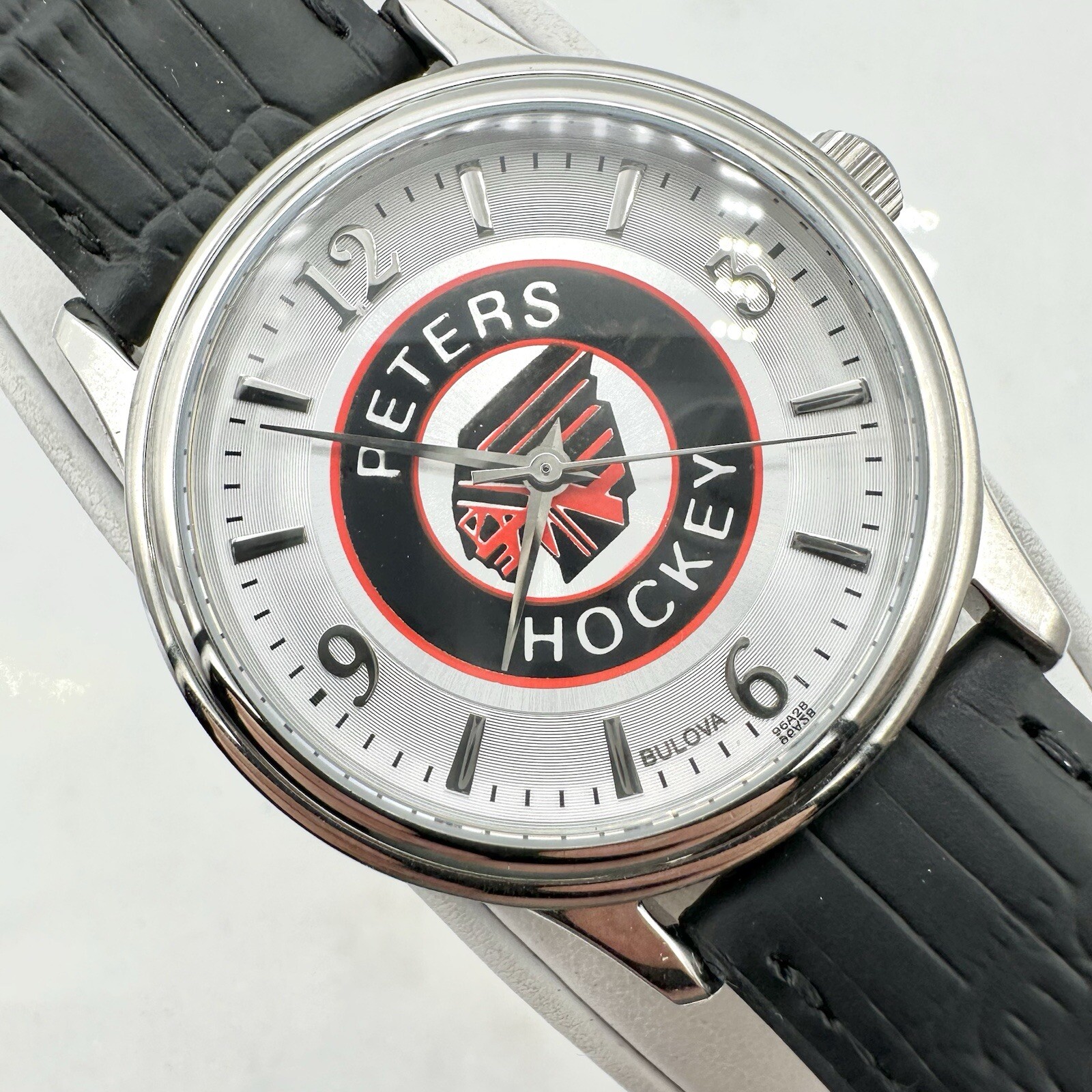 NWT - Bulova Men's Watch 96A28 “Peter’s Hockey” Silver Dial Black Leather 38mm