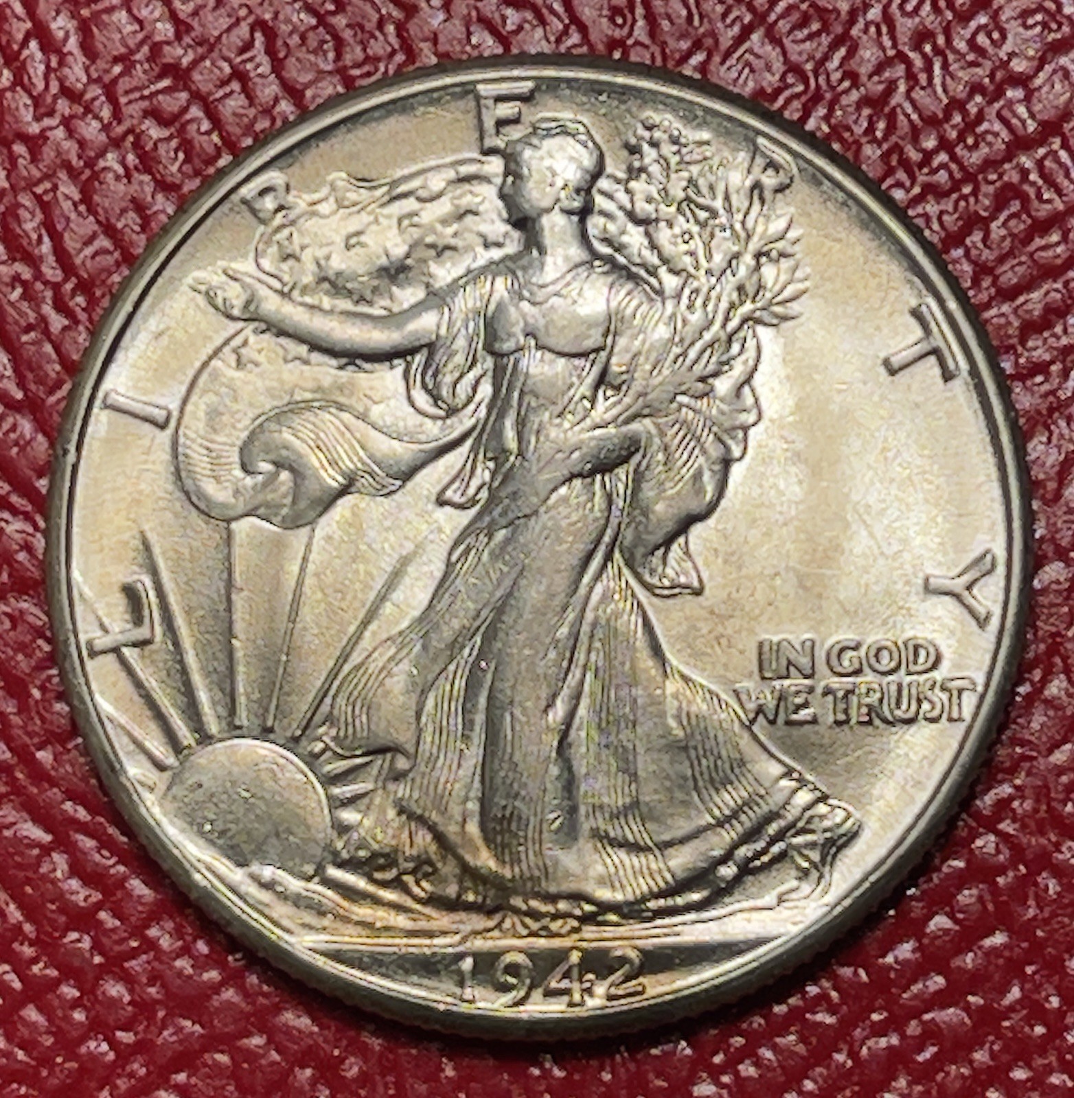 1942 P Walking Liberty Silver Half Dollar, Choice to Gem Uncirculated. 1942 P Walking Liberty Silver Half Dollar, Choice to Gem Uncirculated.