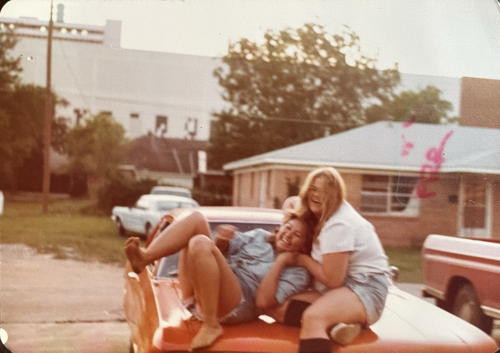 Vintage Photo Women Girlfriends Sitting On Car Hood Affectionate Barefoot 1970s Vintage Photo Women Girlfriends Sitting On Car Hood Affectionate Barefoot 1970s