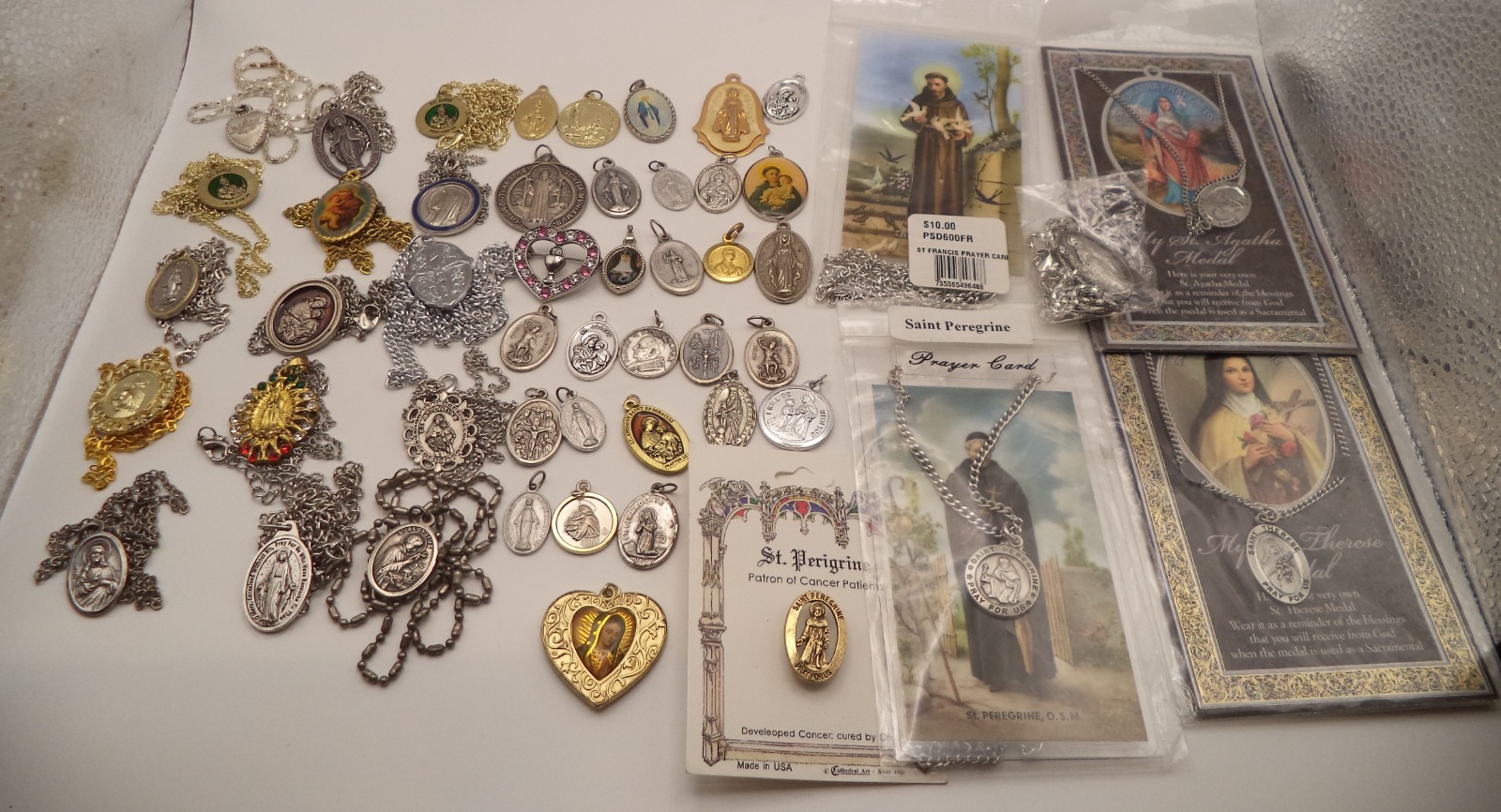 Vintage Catholic Medal Lot - 15 Necklaces, 30 Loose Medals, 5 NOS Prayer Cards Vintage Catholic Medal Lot - 15 Necklaces, 30 Loose Medals, 5 NOS Prayer Cards