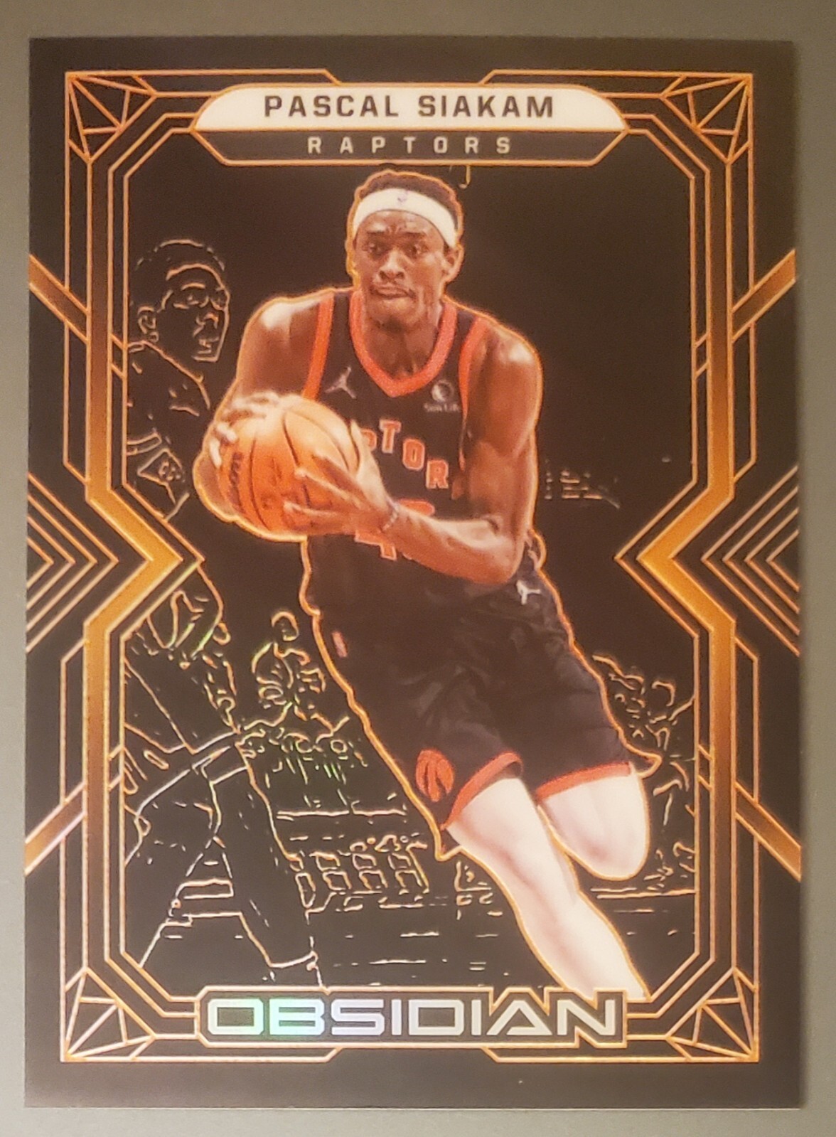 2021-22 Panini Obsidian - Pascal Siakam #87 - Electric Etch Orange /50 2021-22 Panini Obsidian - Pascal Siakam #87 - Electric Etch Orange /50