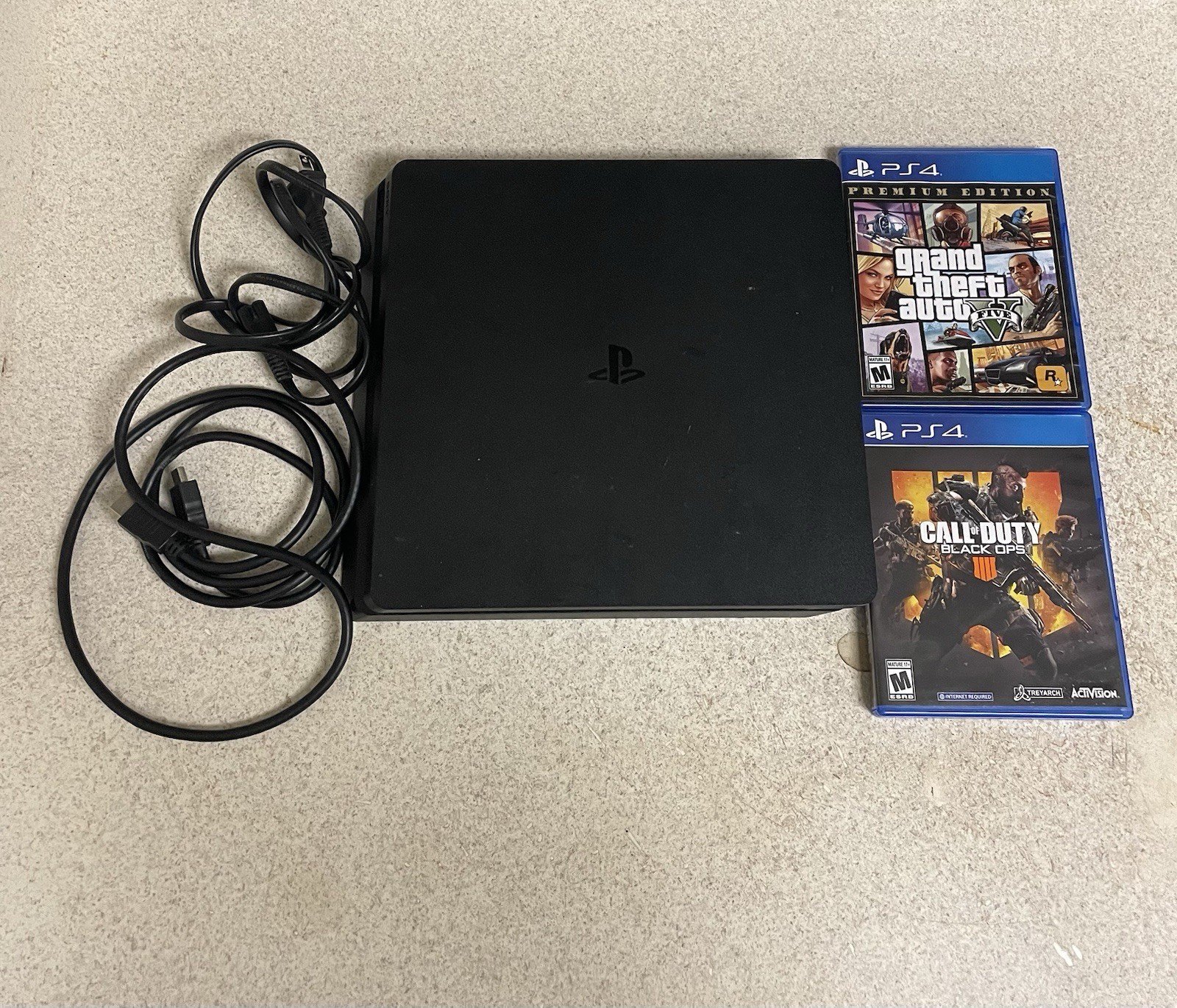 Sony PlayStation 4 Slim Console w/ Power Cable + GTA V BO4 500GB Storage Working Sony PlayStation 4 Slim Console w/ Power Cable + GTA V BO4 500GB Storage Working