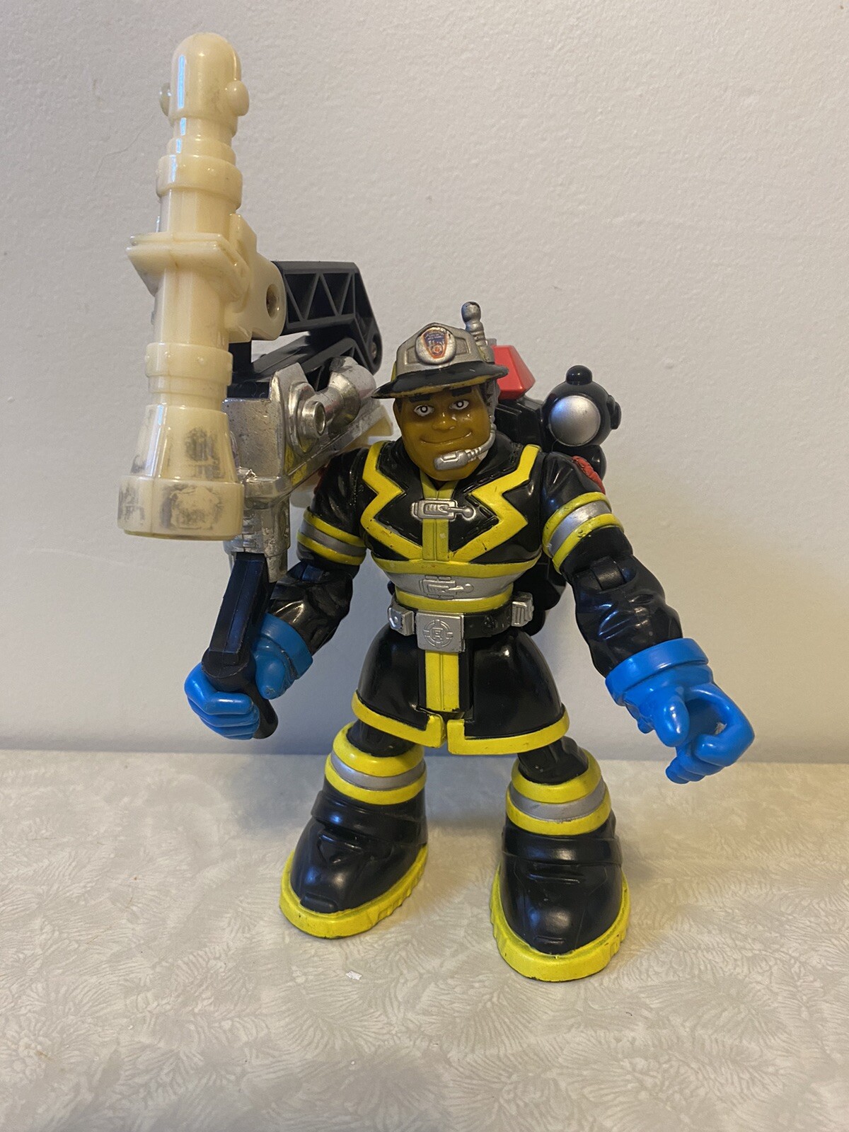 Vintage 1997 Rescue Heroes Manny Hattan Fisher Price Fireman With Water Cannon Vintage 1997 Rescue Heroes Manny Hattan Fisher Price Fireman With Water Cannon