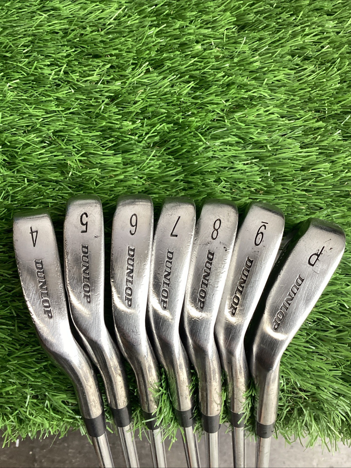 Dunlop Ti Black Iron Set 4-PW With Firm Steel Shafts
