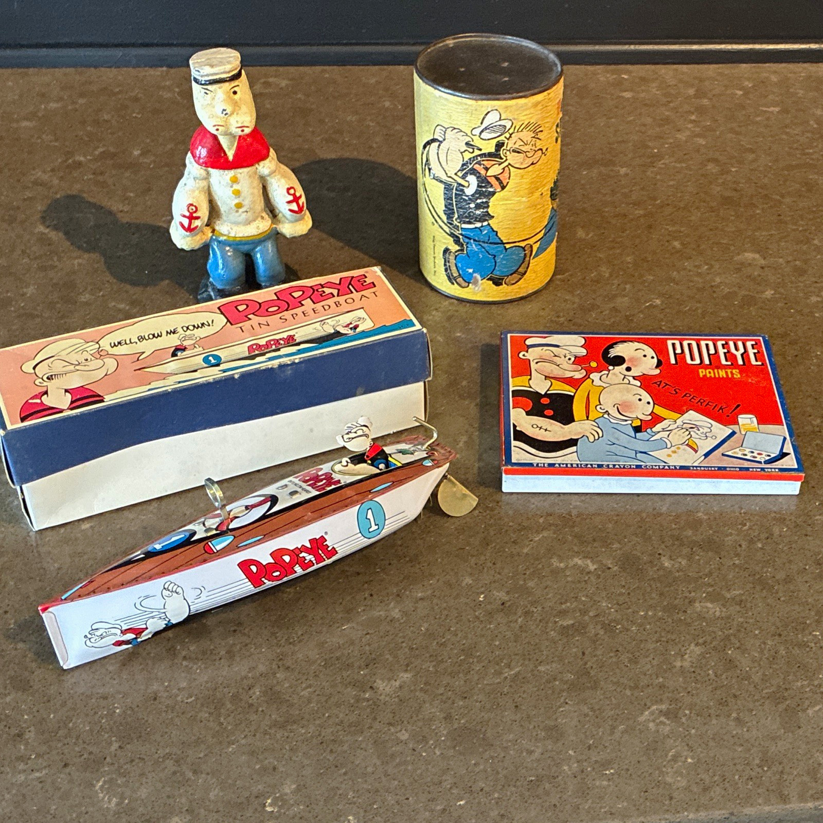 Vintage Popeye Bank, Tin Speedboat, Spinach Can, and Paints Tin Vintage Popeye Bank, Tin Speedboat, Spinach Can, and Paints Tin