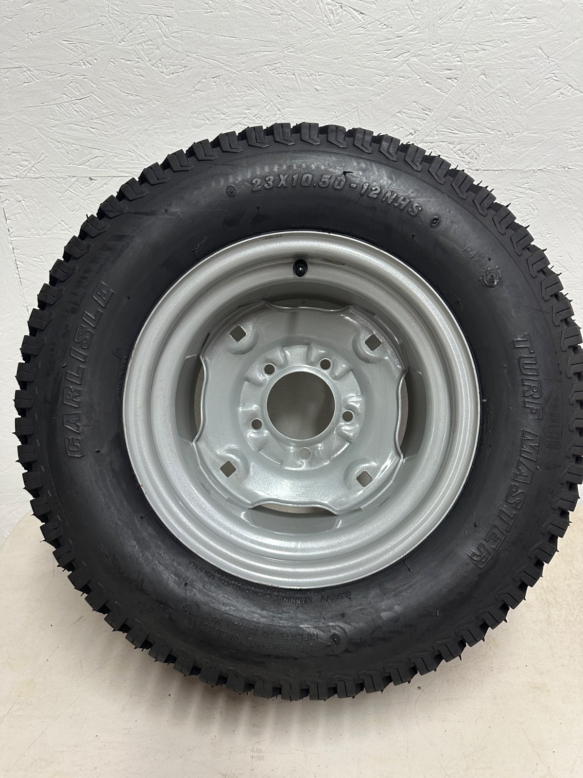 Carlisle Wheel & Tire Assembly 23 x 10.50 - 12 NHS 5 Lug Turf Thread Offset Hub Carlisle Wheel & Tire Assembly 23 x 10.50 - 12 NHS 5 Lug Turf Thread Offset Hub